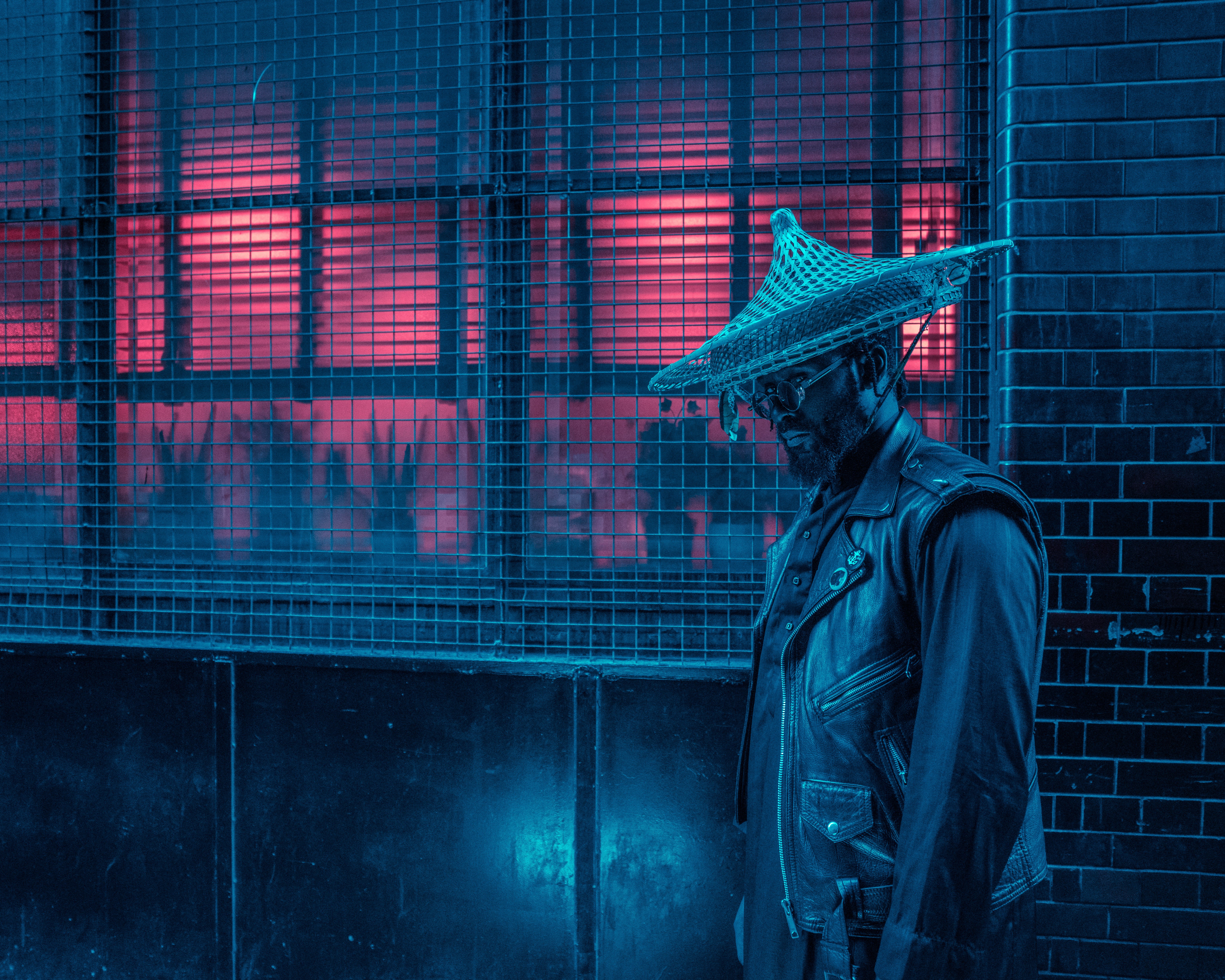 leather, man, clothing, representation, artist, standing, 5K, blue, teal, conical, architecture, city, tokyo, men, wearing, musician, screen, london, creativity, HD Wallpaper