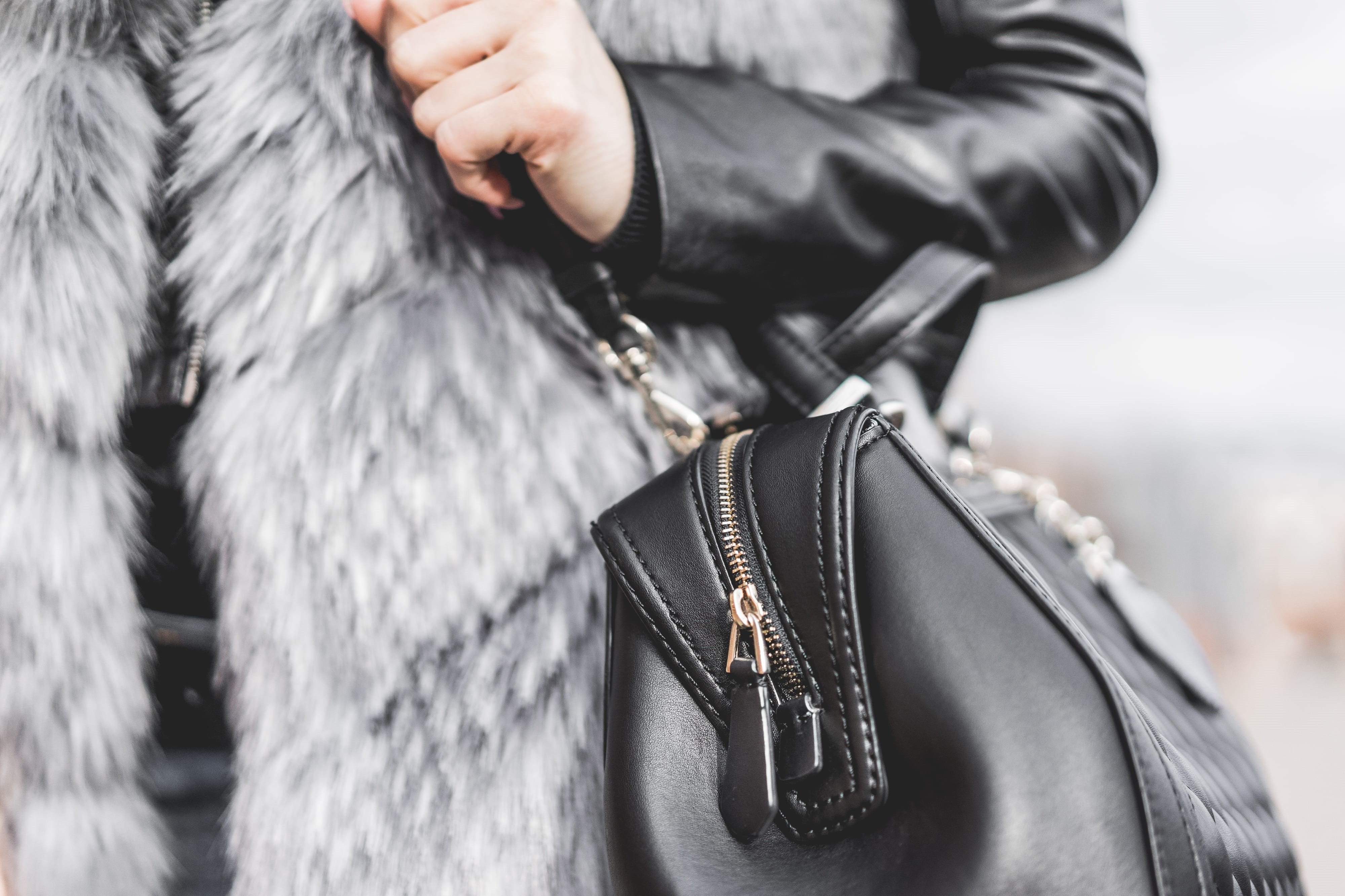 Woman, weapon, Holding, day, city, black, leather jacket, jacket, selective focus, elegance, Leather, midsection, outdoors, human hand, fashion, focus on foreground, HD Wallpaper