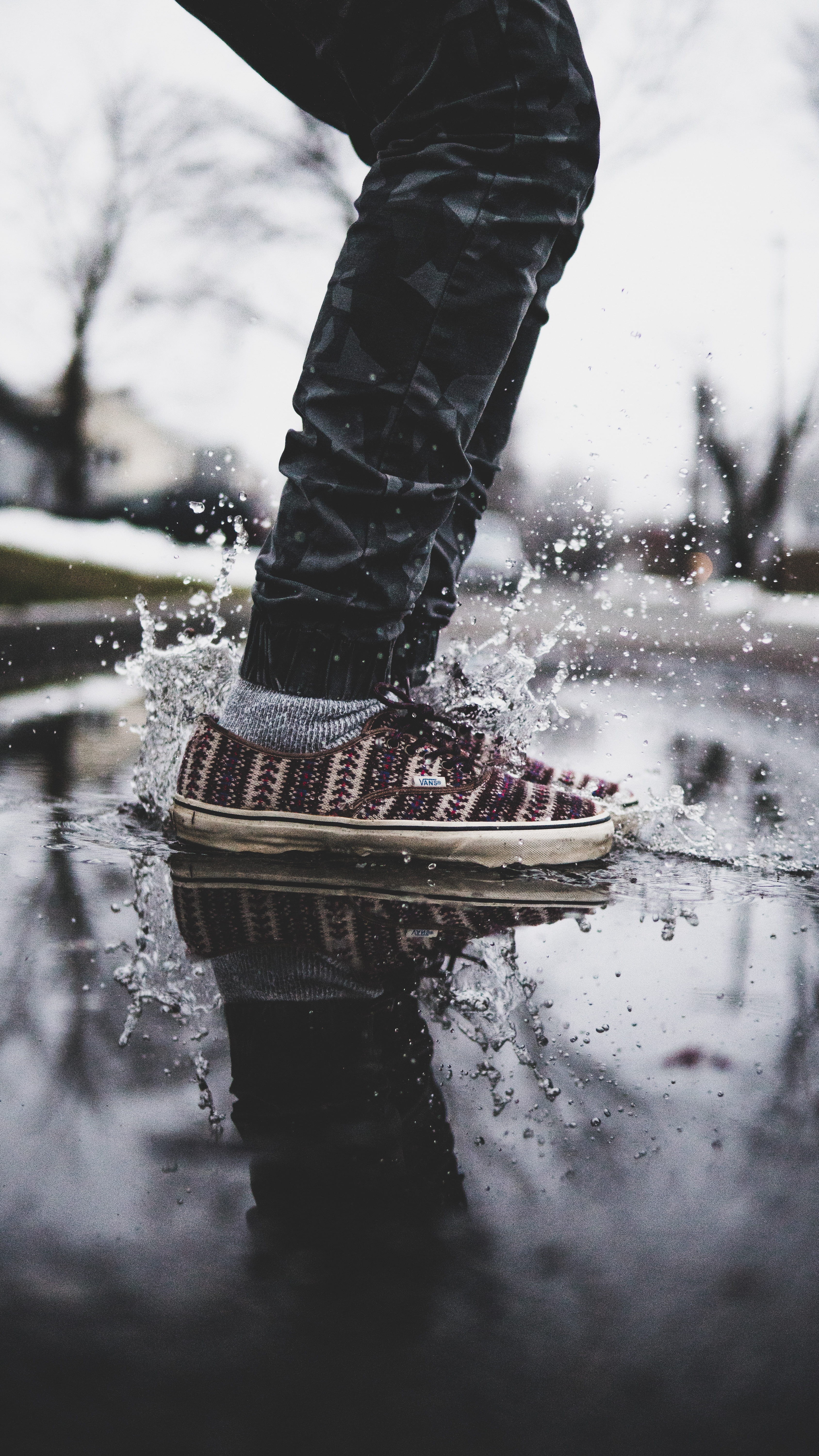 wearing, one person, legs, splash, winter, focus on foreground, sneakers, low, cloudy, vans, nature, real people, shoes, human leg, human limb, leisure activity, Phone HD Wallpaper
