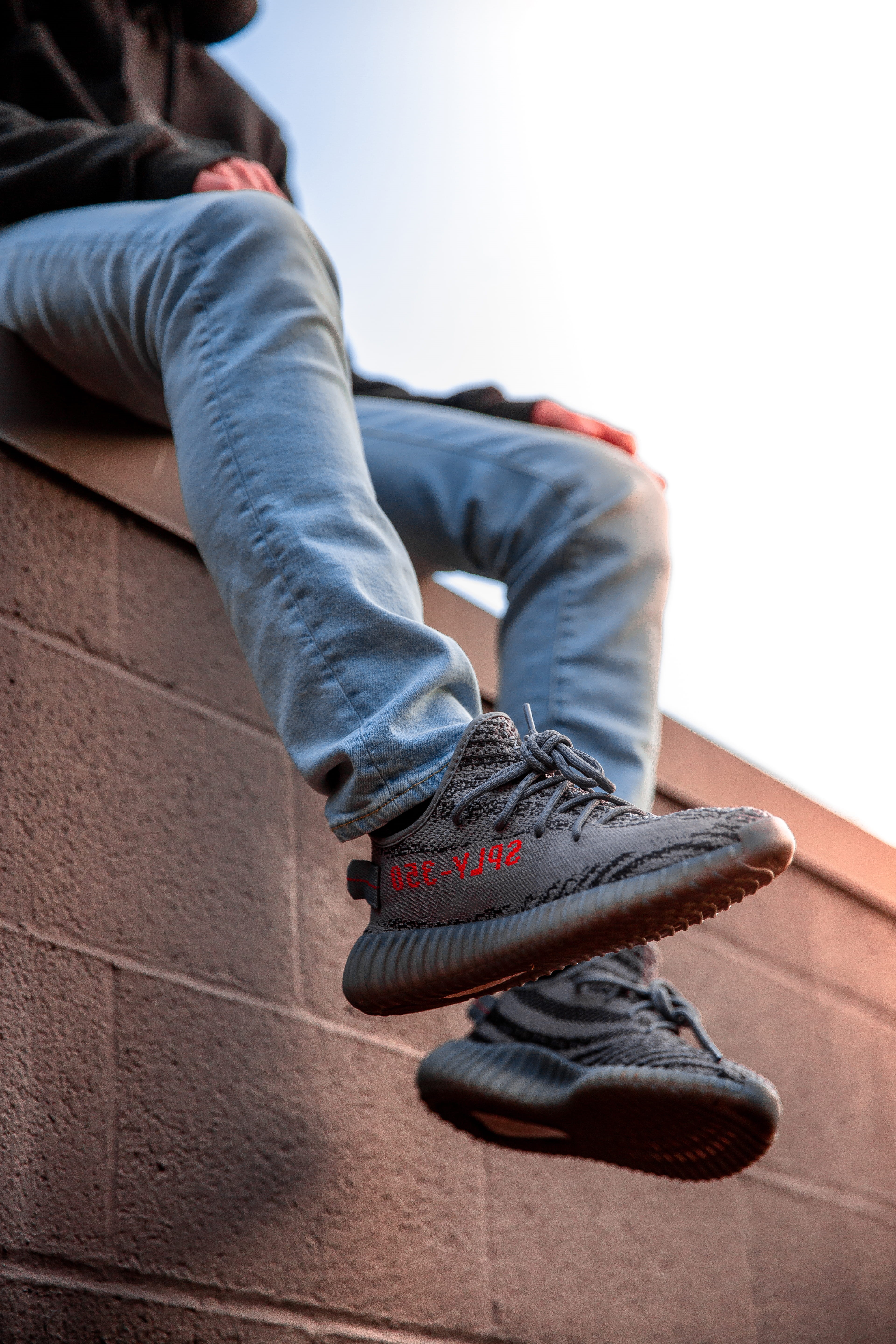real people, adidas, shoe, wear, person, human leg, body part, trendy, wearing, shoes, sitting, focus on foreground, relaxation, jeans, clothing, one person, Phone HD Wallpaper