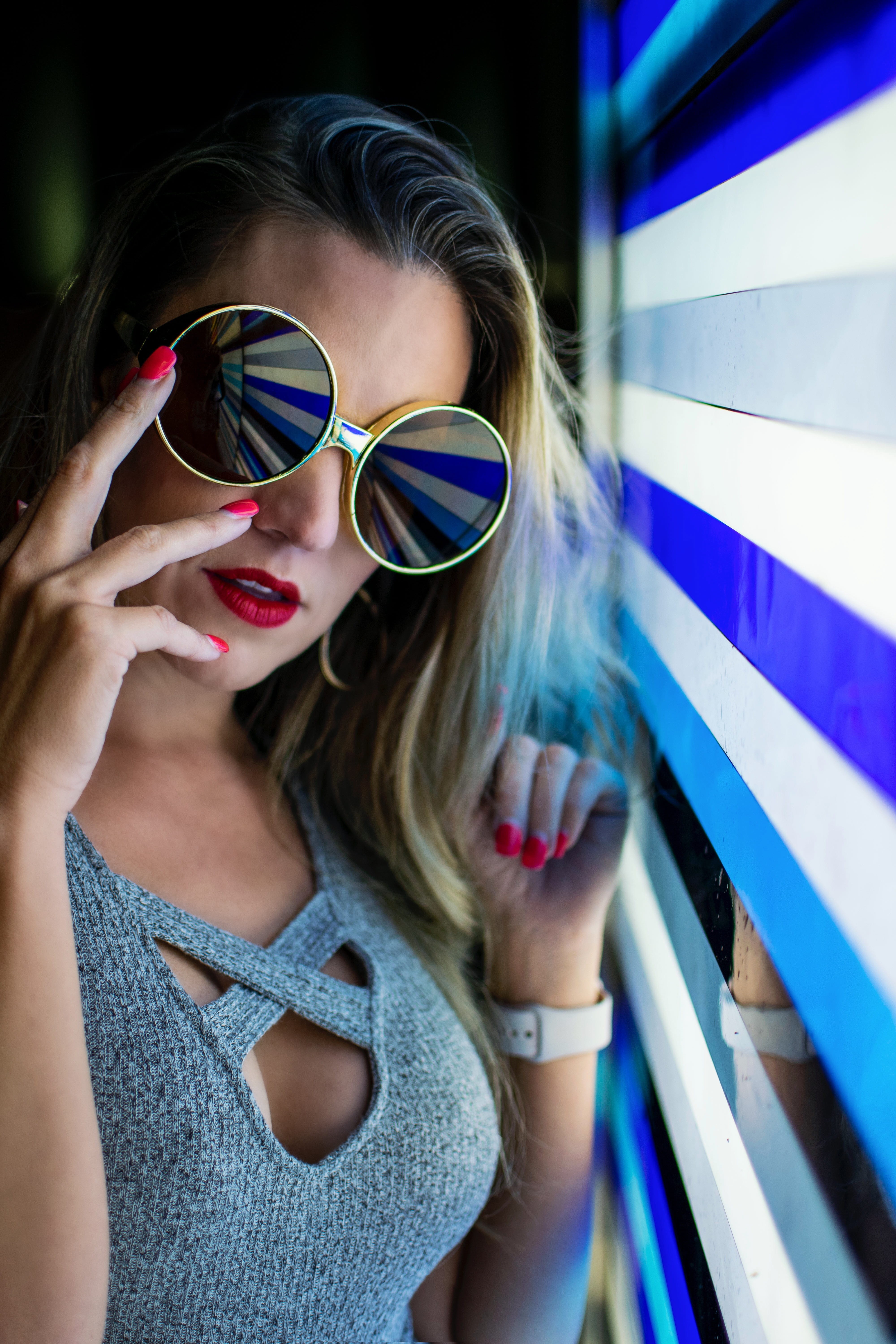 young adult, top, standing, real people, nail, blue, night, beside, lifestyles, hairstyle, reflection, city, sunglasses, front view, beautiful woman, wall, Phone HD Wallpaper
