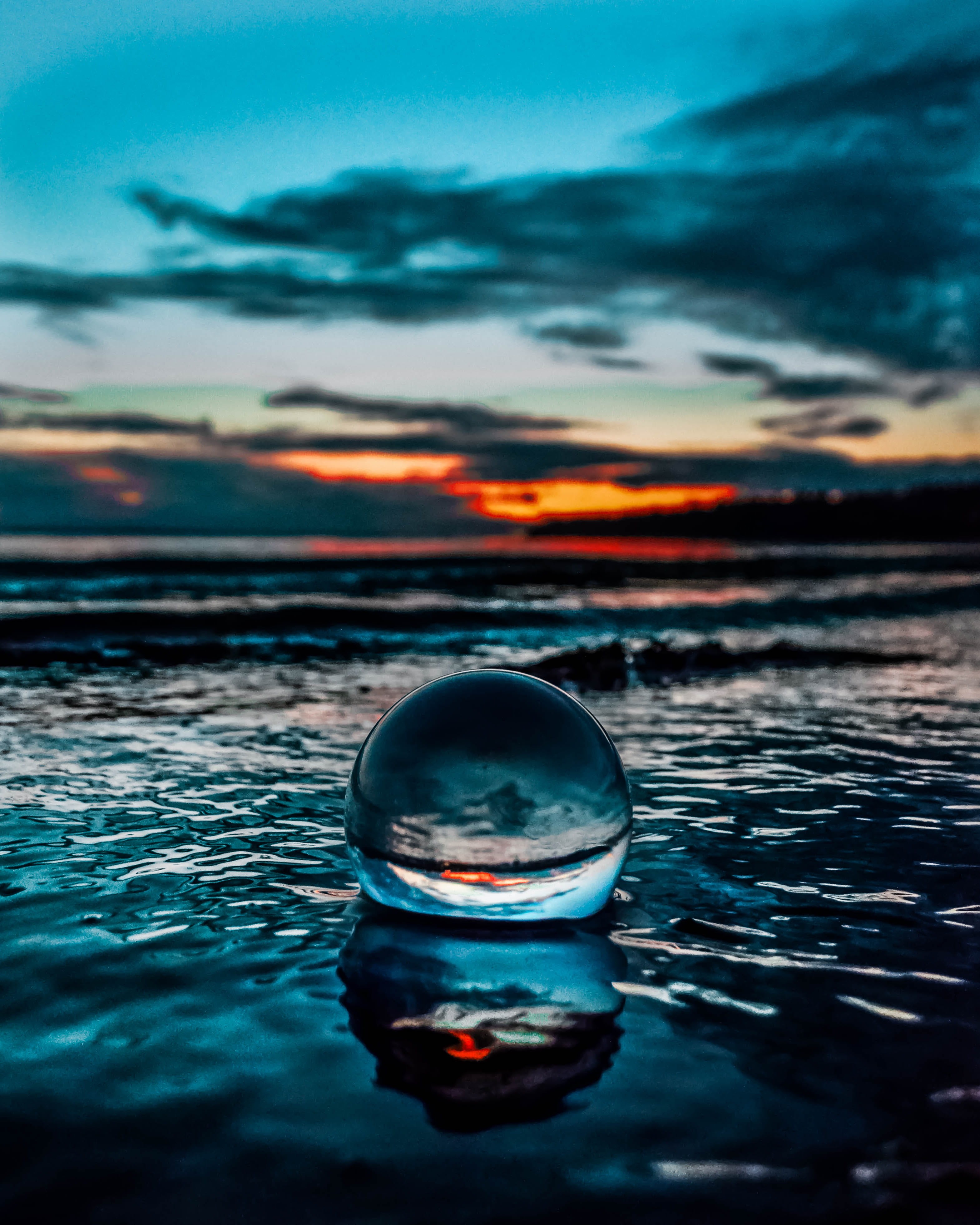 selective focus, waterfront, sphere, crystal, nature, reflections, ball, waves, clouds, reflection, sky, water, close-up, outdoors, tranquil scene, seashore, Phone HD Wallpaper