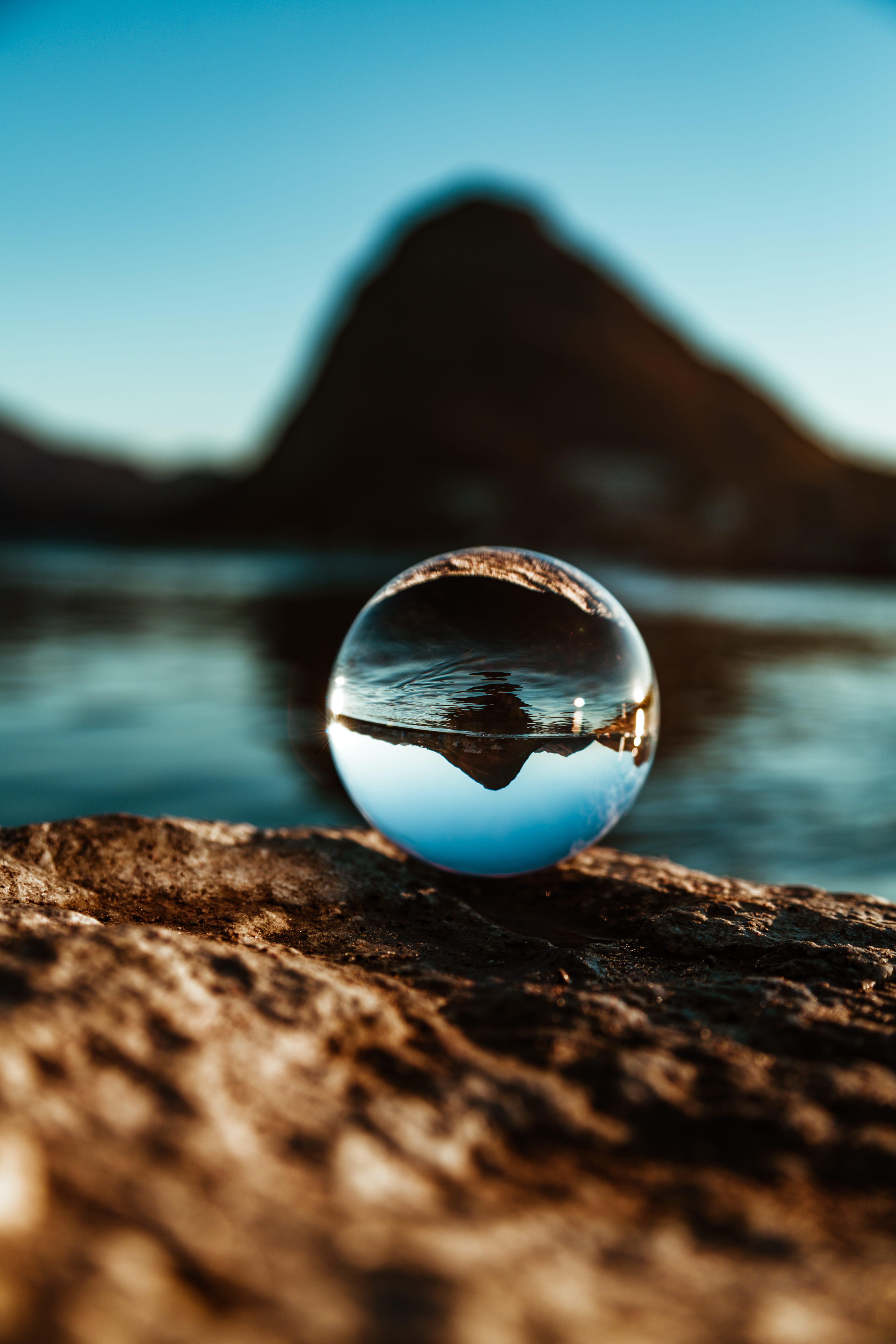 mountain, tranquility, reflection, close-up, photo, outdoors, crystal ball, no people, depth of field, lake, 5K, sphere, day, crystal, selective focus, Phone HD Wallpaper