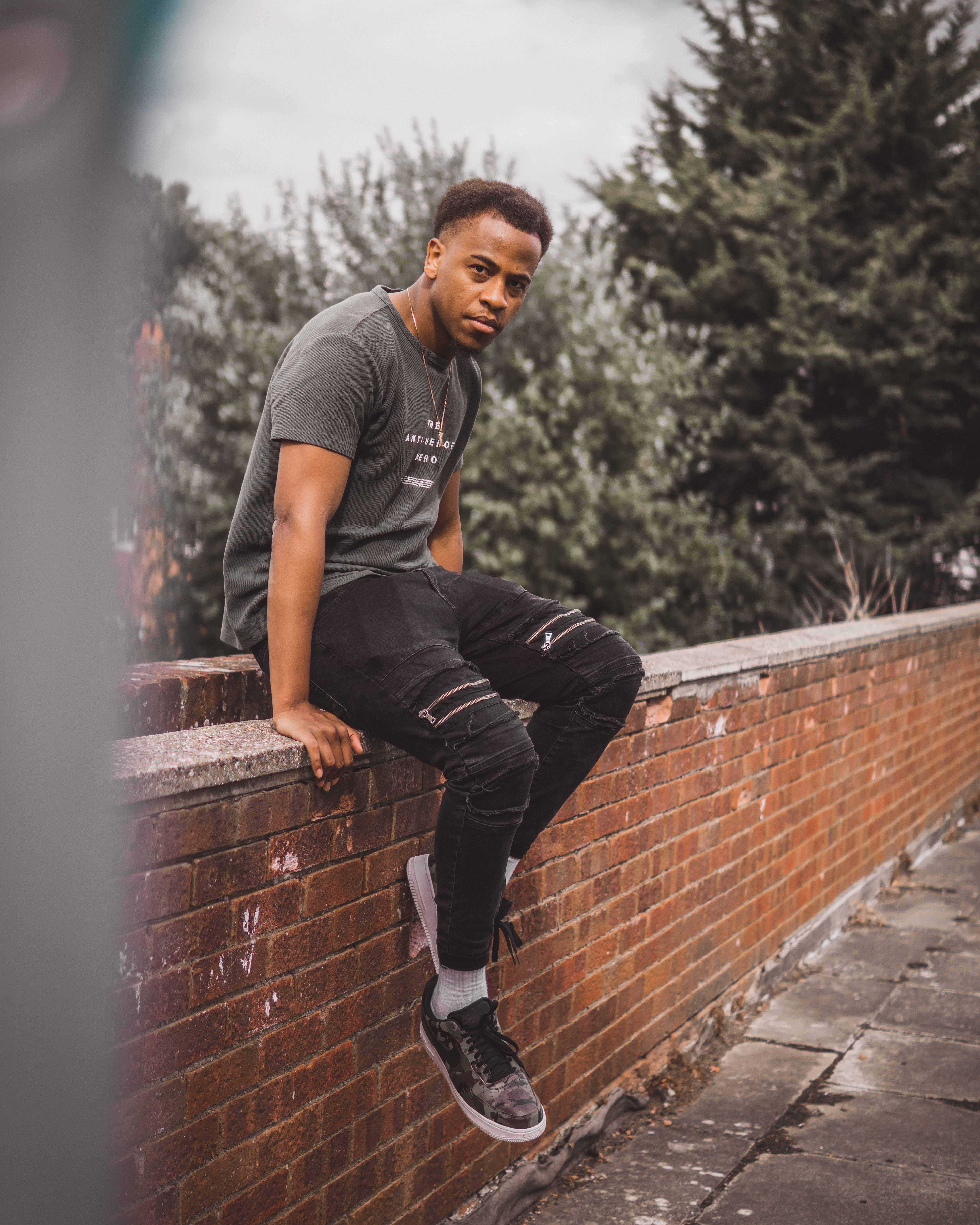 style, brick, sat, street, pose, road, men, 4K, clothing, people, sitting, man, outdoors, architecture, young men, trees, urban, human, person, lifestyles, Phone HD Wallpaper