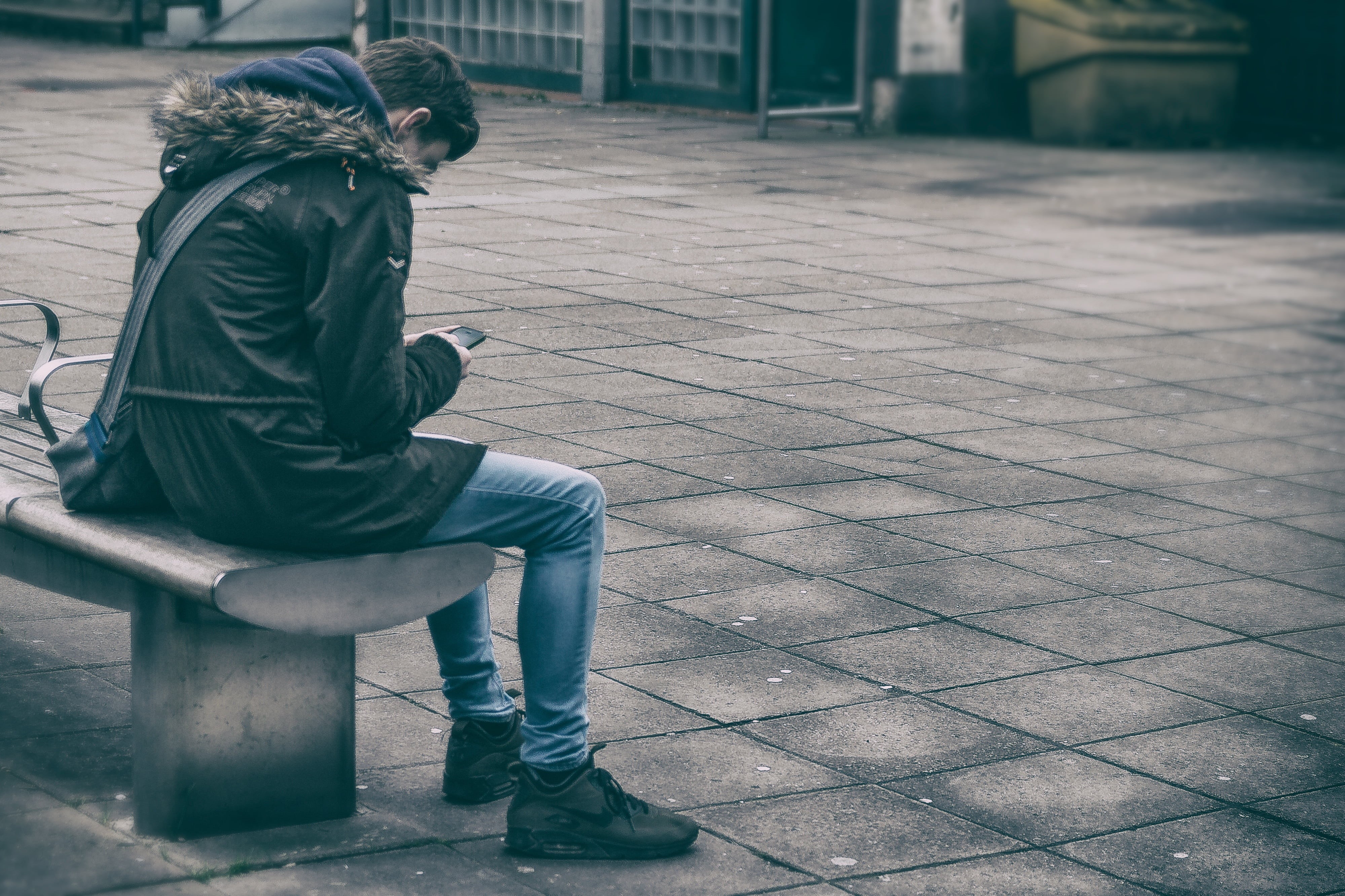 casual clothing, outdoors, city, coat, gang, people, leisure activity, warm clothing, holding, sit, fashion, winter, bench, texting, young adult, black, HD Wallpaper