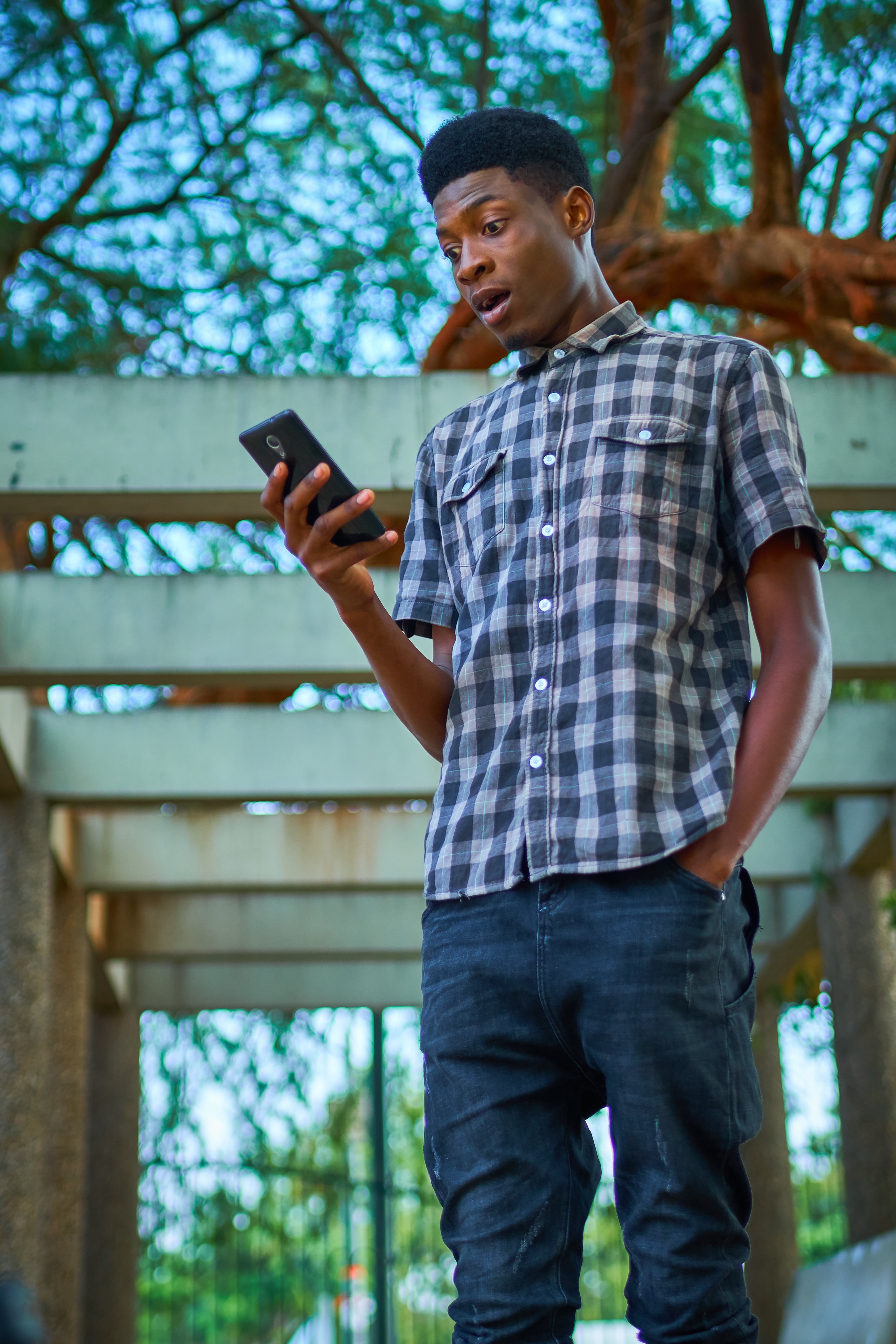 one Person, day, mobile Phone, white, teenager, connection, man, smart Phone, shirt, portable information device, wearing, standing, button, social, gray, Phone HD Wallpaper