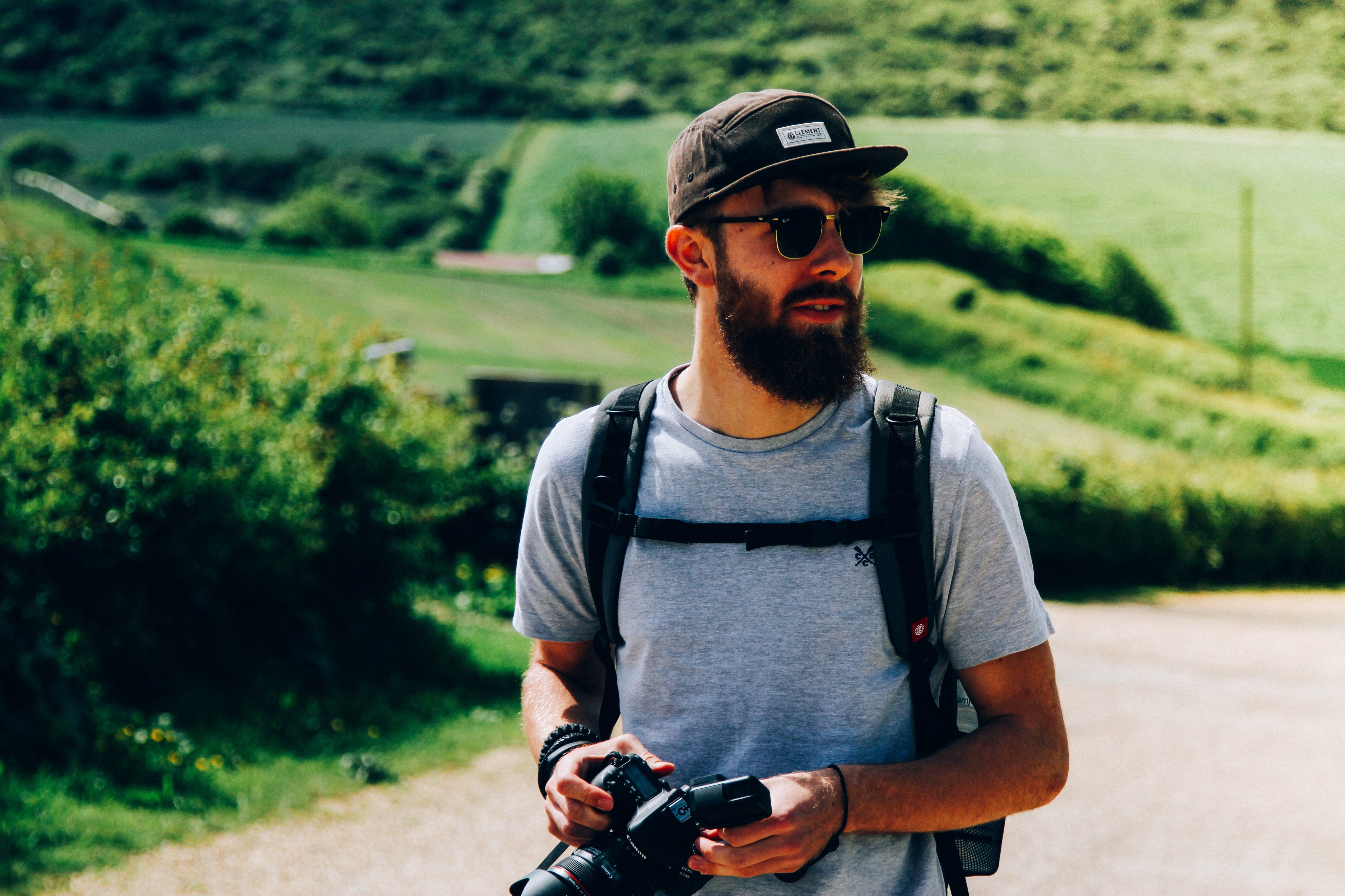 casual clothing, leisure Activity, 5K, dslr, front view, Lost, land, cycling, t, white, men, neck, real people, technology, activity, camera, green, photography themes, HD Wallpaper