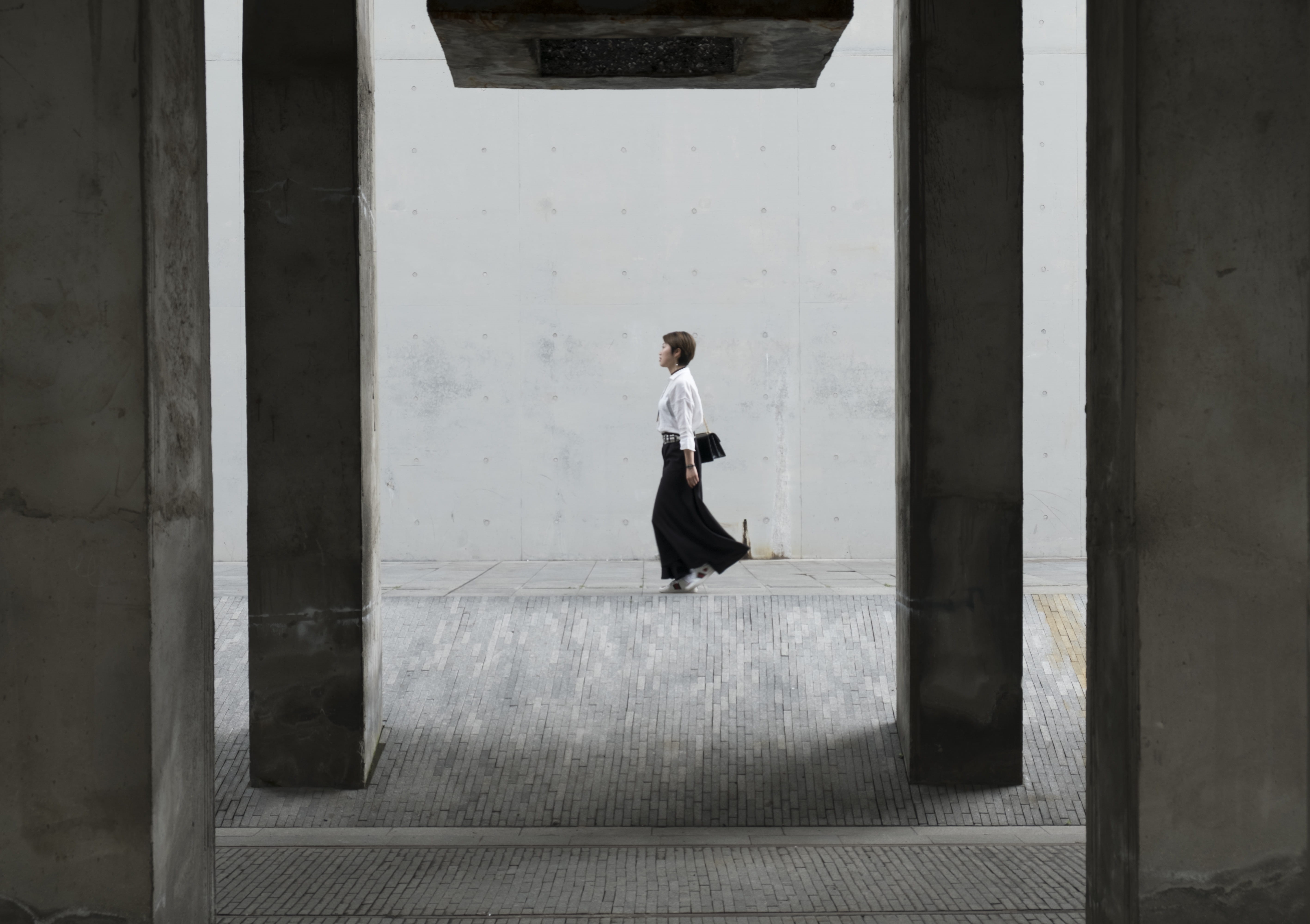 walking, women, black, frame, near, casual clothing, wall, day, long, sitting, standing, built structure, bridge, one person, architectural column, real people, HD Wallpaper