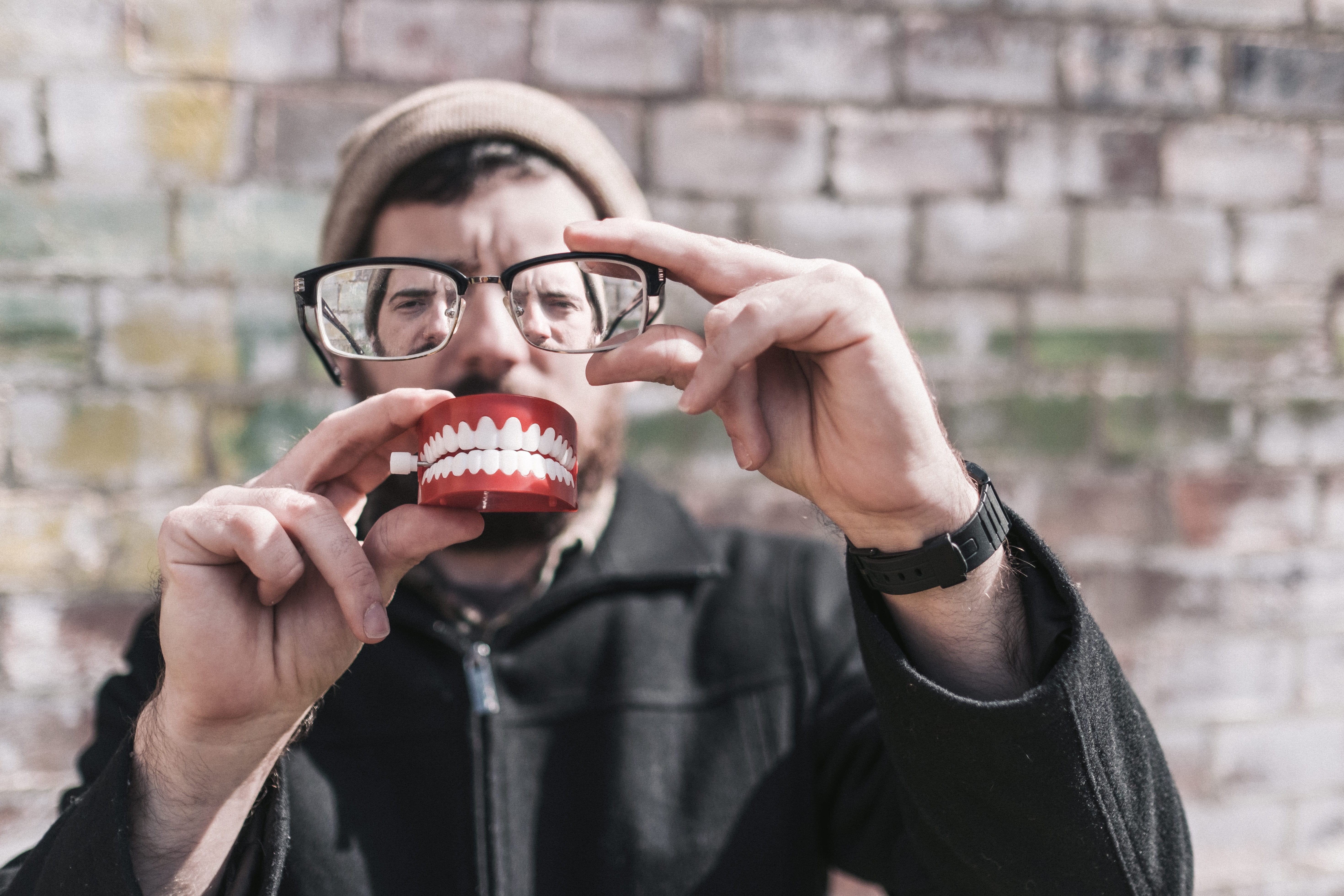 whimisical, glasses, one man only, hipster, brick wall, adults only, wierd, 5K, portrait, leisure activity, wall, headshot, adult, caucasian Ethnicity, HD Wallpaper