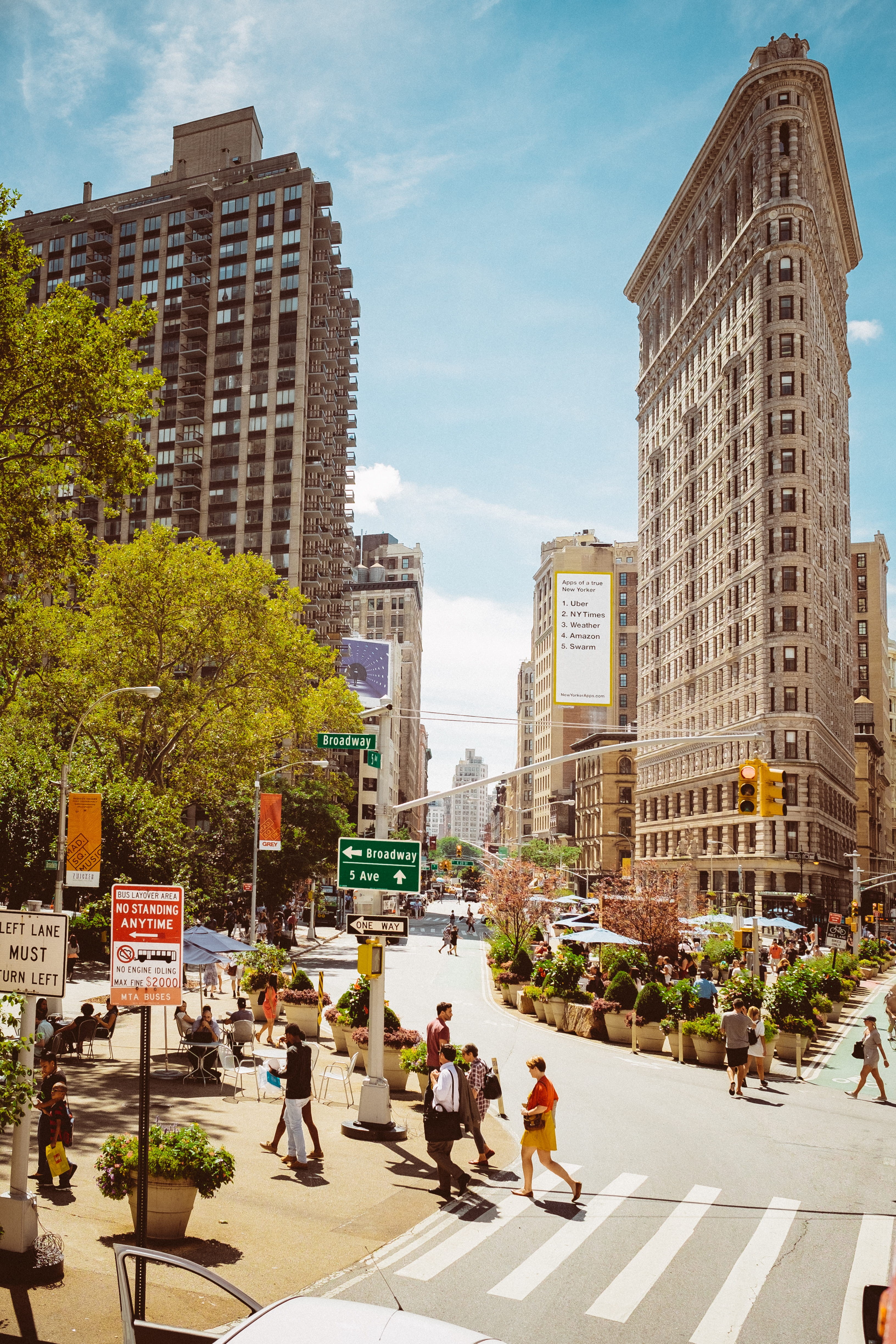 broadway, city, building, trees, mode of transportation, nature, plant, city street, blue, built structure, green, group of people, summer, city life, office building exterior, Phone HD Wallpaper