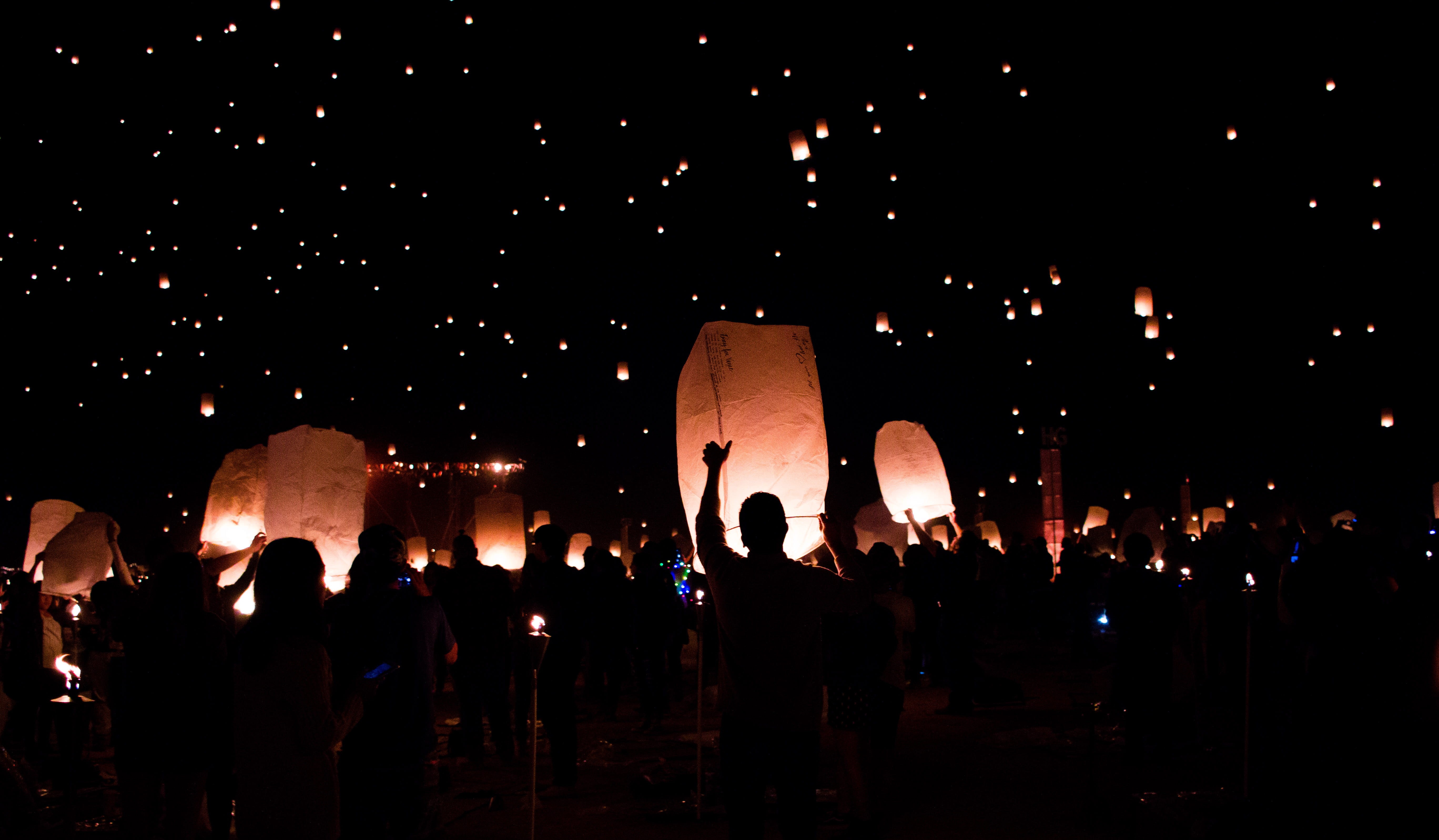 holding, group of people, sky, standing, silhouette, lifestyles, float, arts culture and entertainment, 5K, architecture, fire, hope, celebration, large group of people, HD Wallpaper