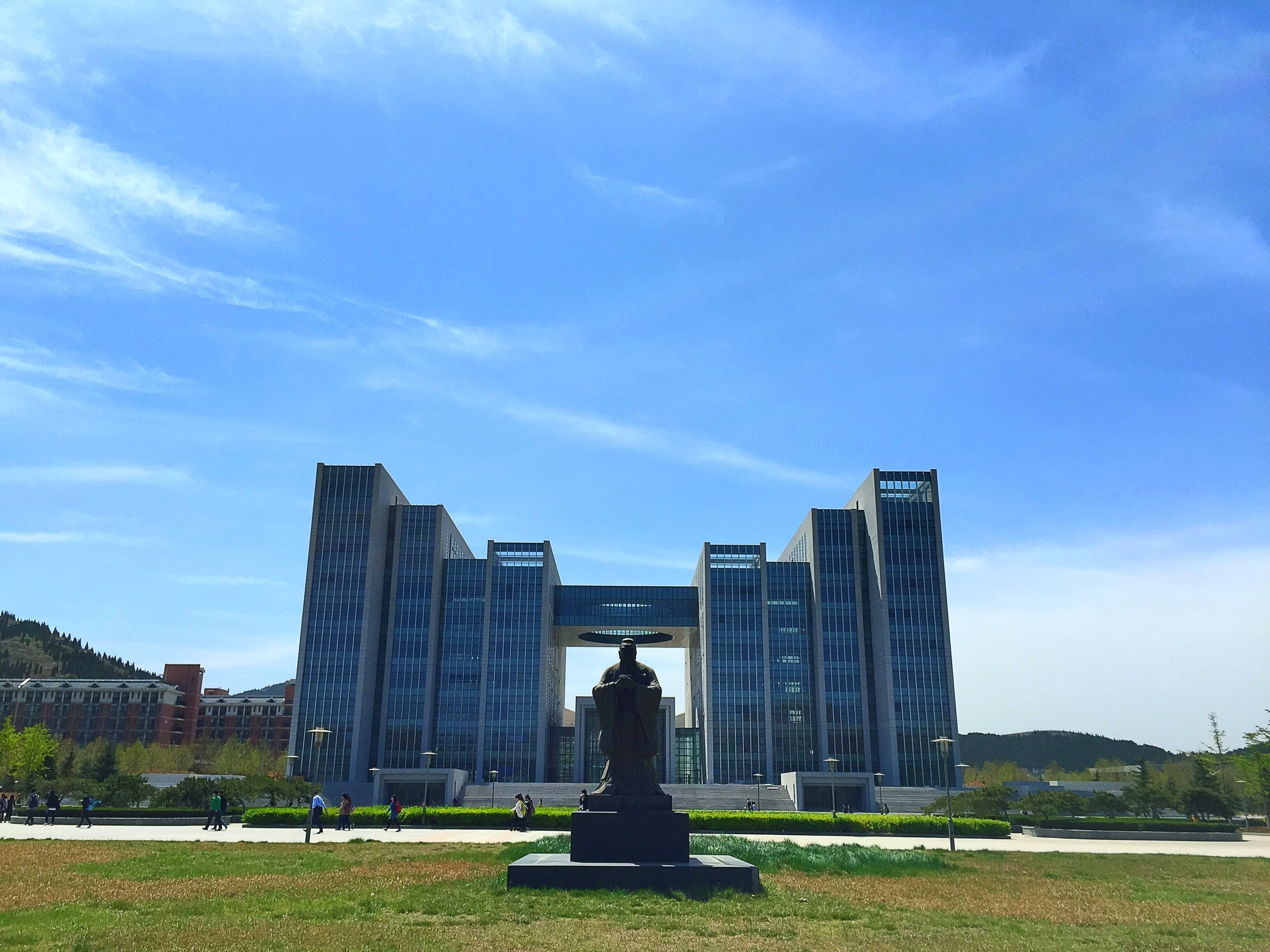 nature, confucius, one person, adult, sitting, women, architecture, modern, grass, building exterior, university, outdoors, sky, day, field, cloud - sky, HD Wallpaper