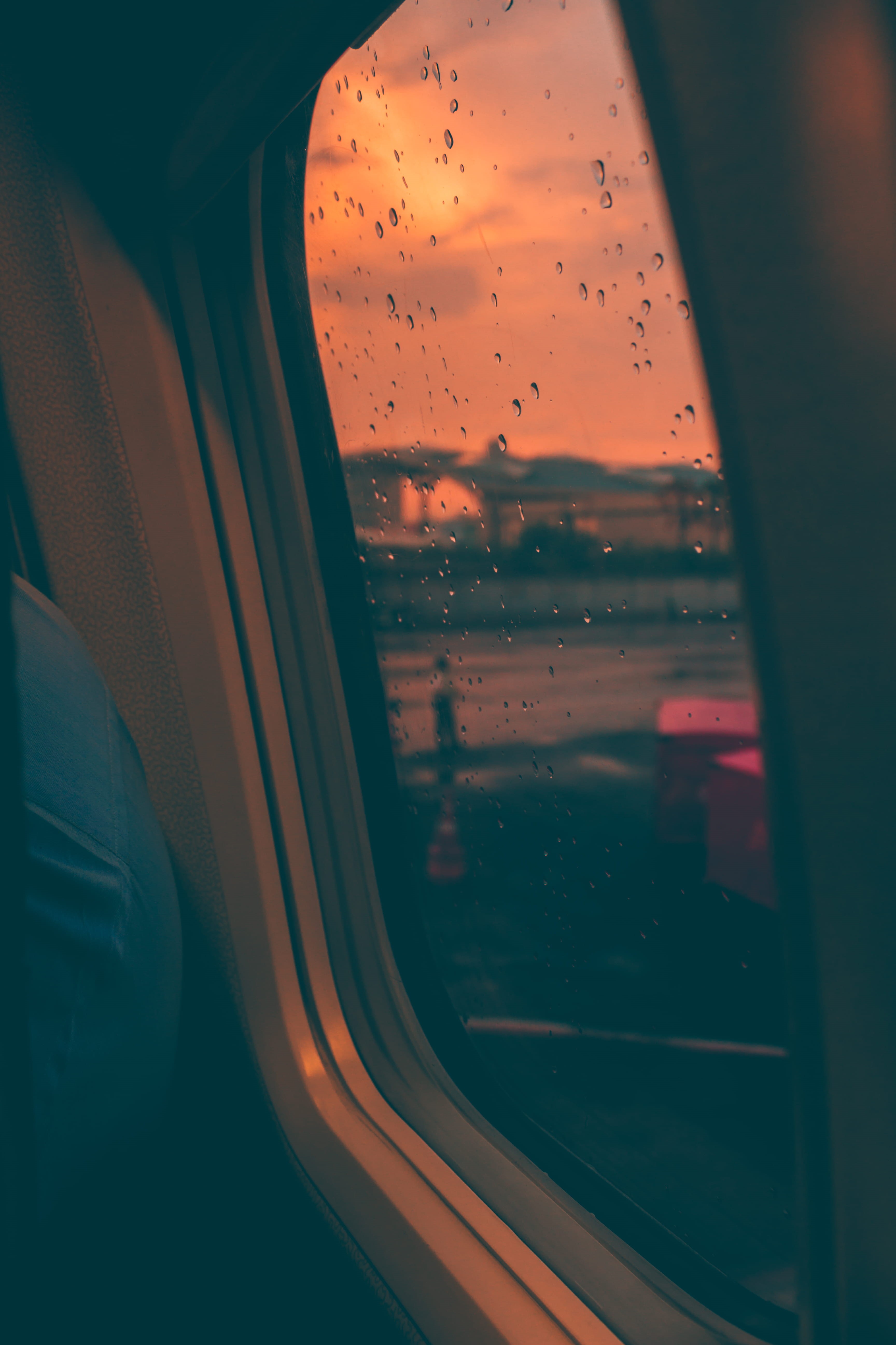 car, new delhi, air vehicle, sunrise, glass, cloudy, plane, raindrops, indoors, indira gandhi international airport, airport, public transportation, sunset, Phone HD Wallpaper