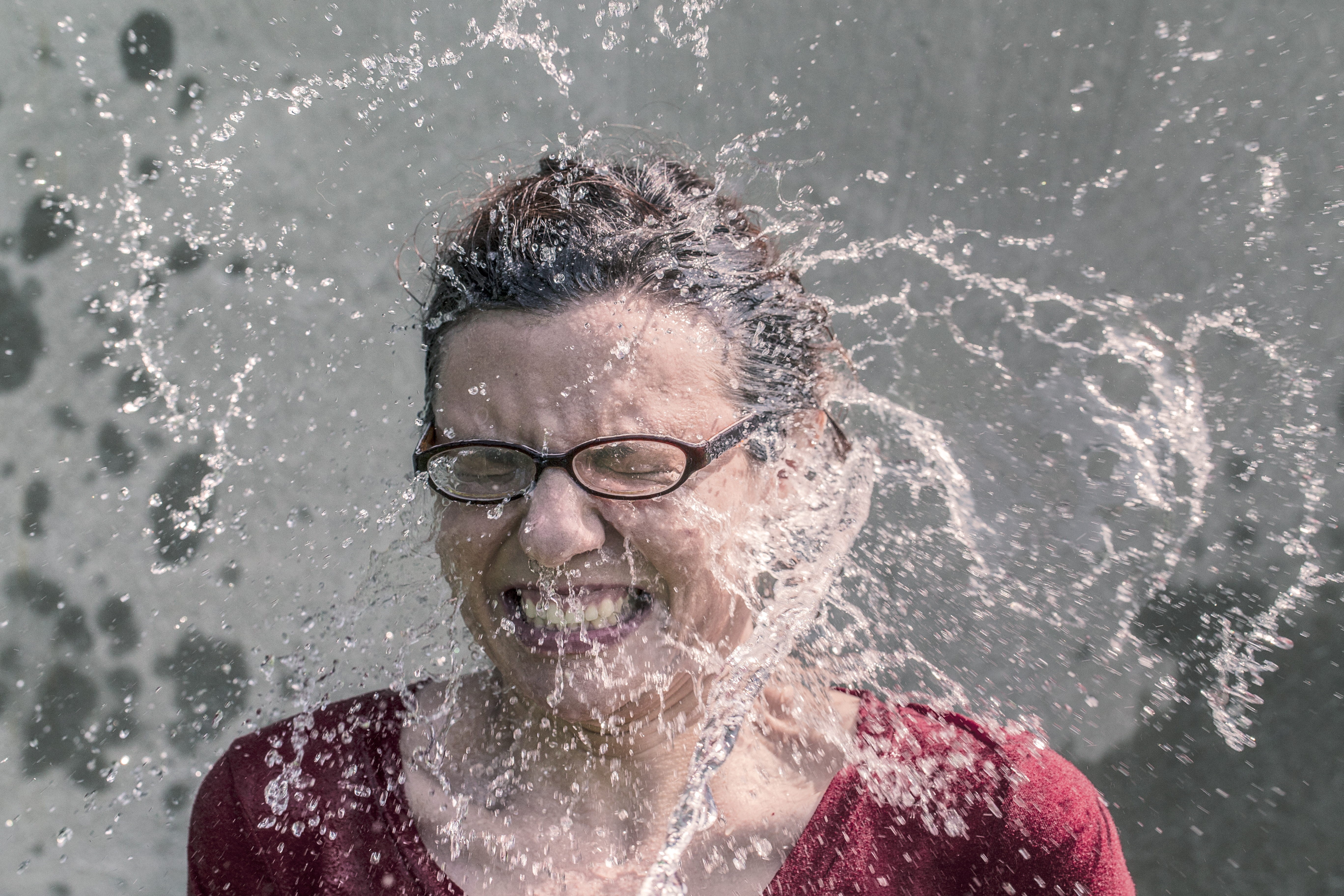 eyeglasses, portrait, water, nature, motion, happiness, glasses, eyes closed, smiling, adult, splashing, wet hair, pouring, mouth open, emotion, hairstyle, HD Wallpaper