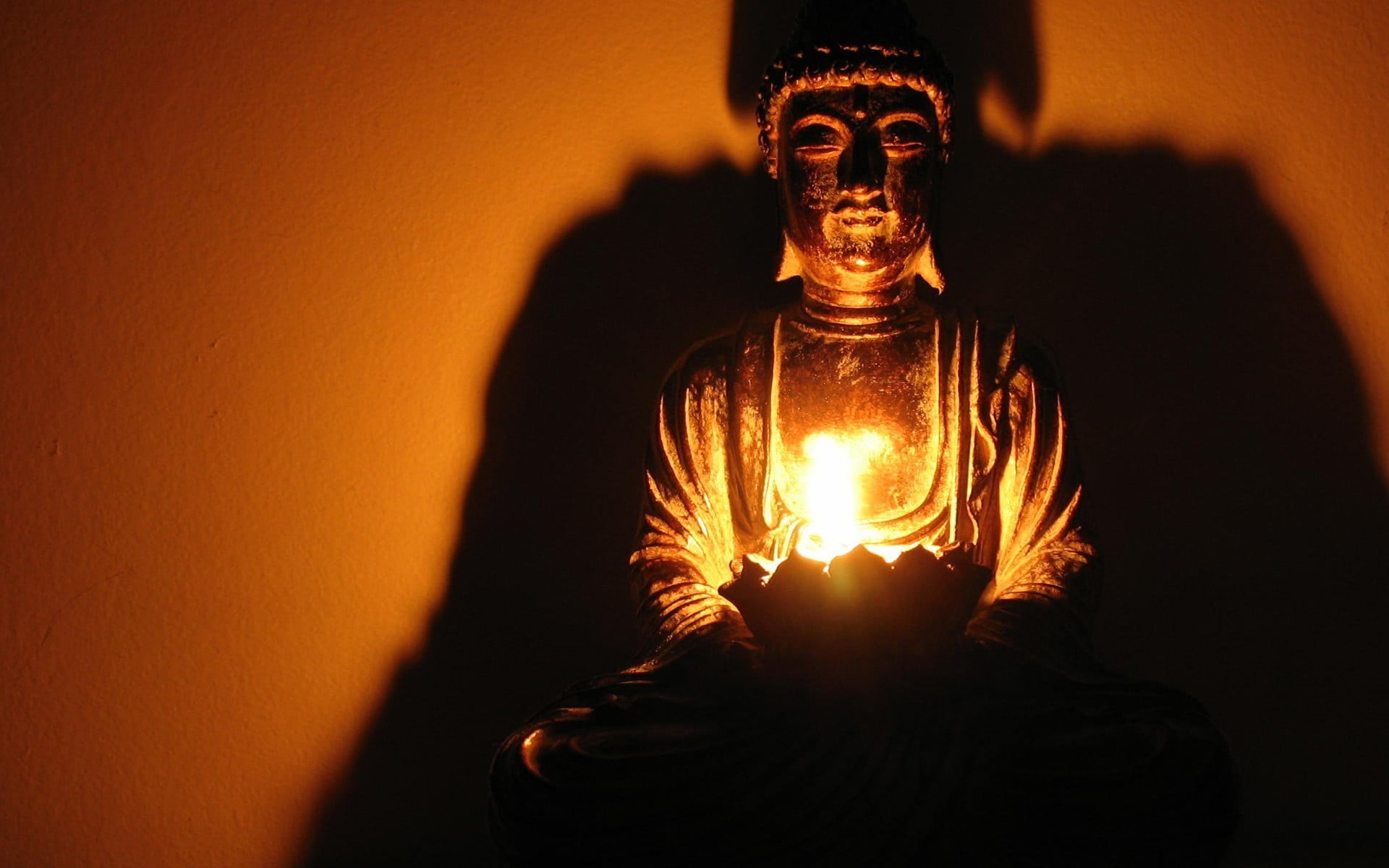 wall - building feature, spiritual, orange color, warning sign, glowing, illuminated, adult, Buddha, mystery, fire, holding, lighting equipment, light bulb, HD Wallpaper