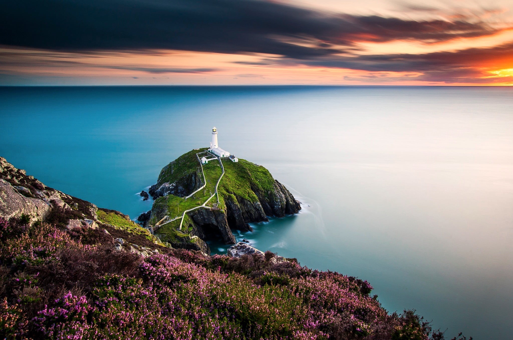 nature, cloud - sky, rock, sunset, 1080P, flowers, non-urban scene, no people, beach, lighthouse, green, idyllic, Wales, sky, horizon over water, grass, HD Wallpaper