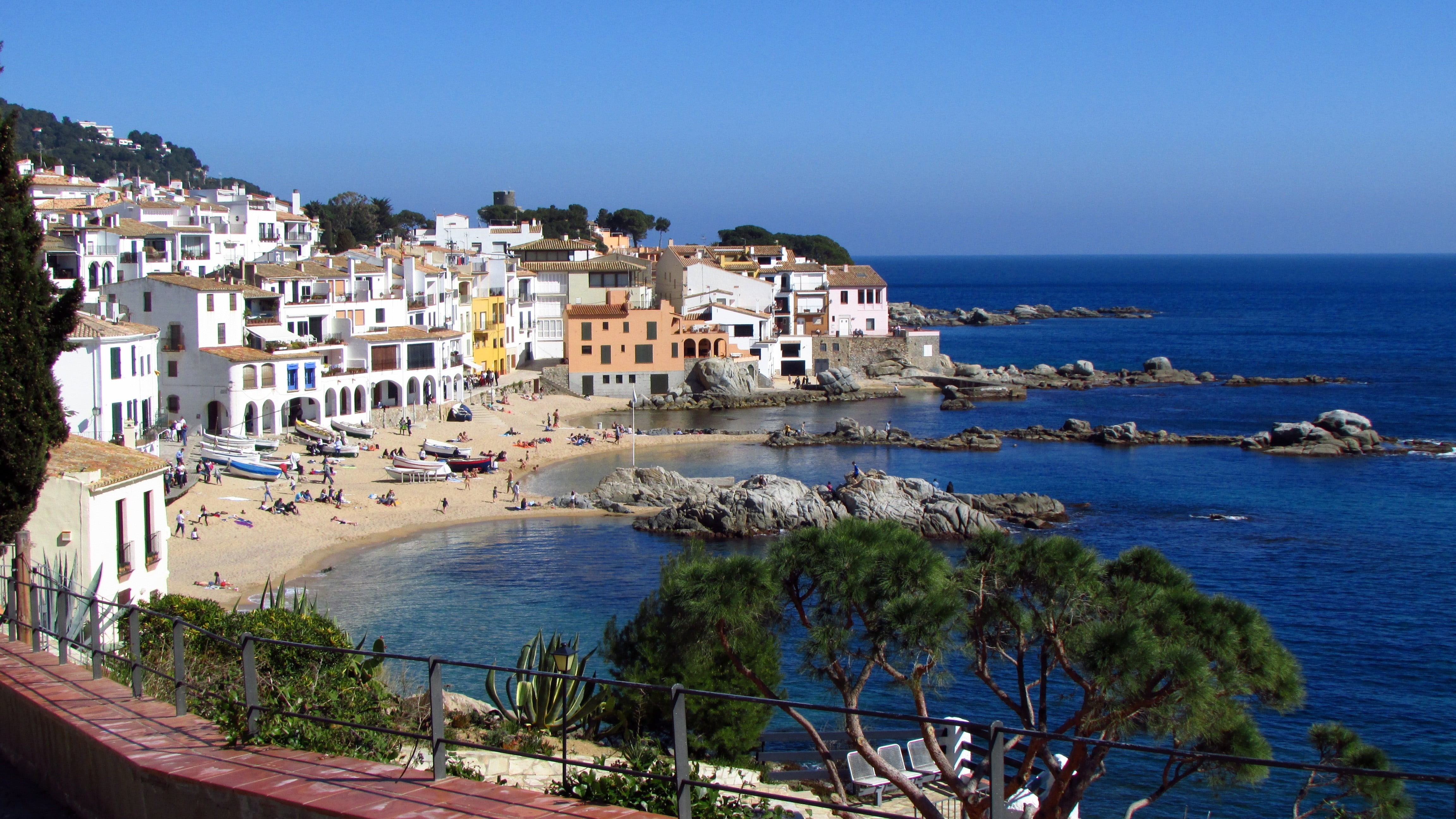 trip, rocks, clear sky, architecture, building, town, outdoors, calella, blue, 4K, sea, people, sand, mediterranean sea, beach, land, travel, horizon over water, HD Wallpaper