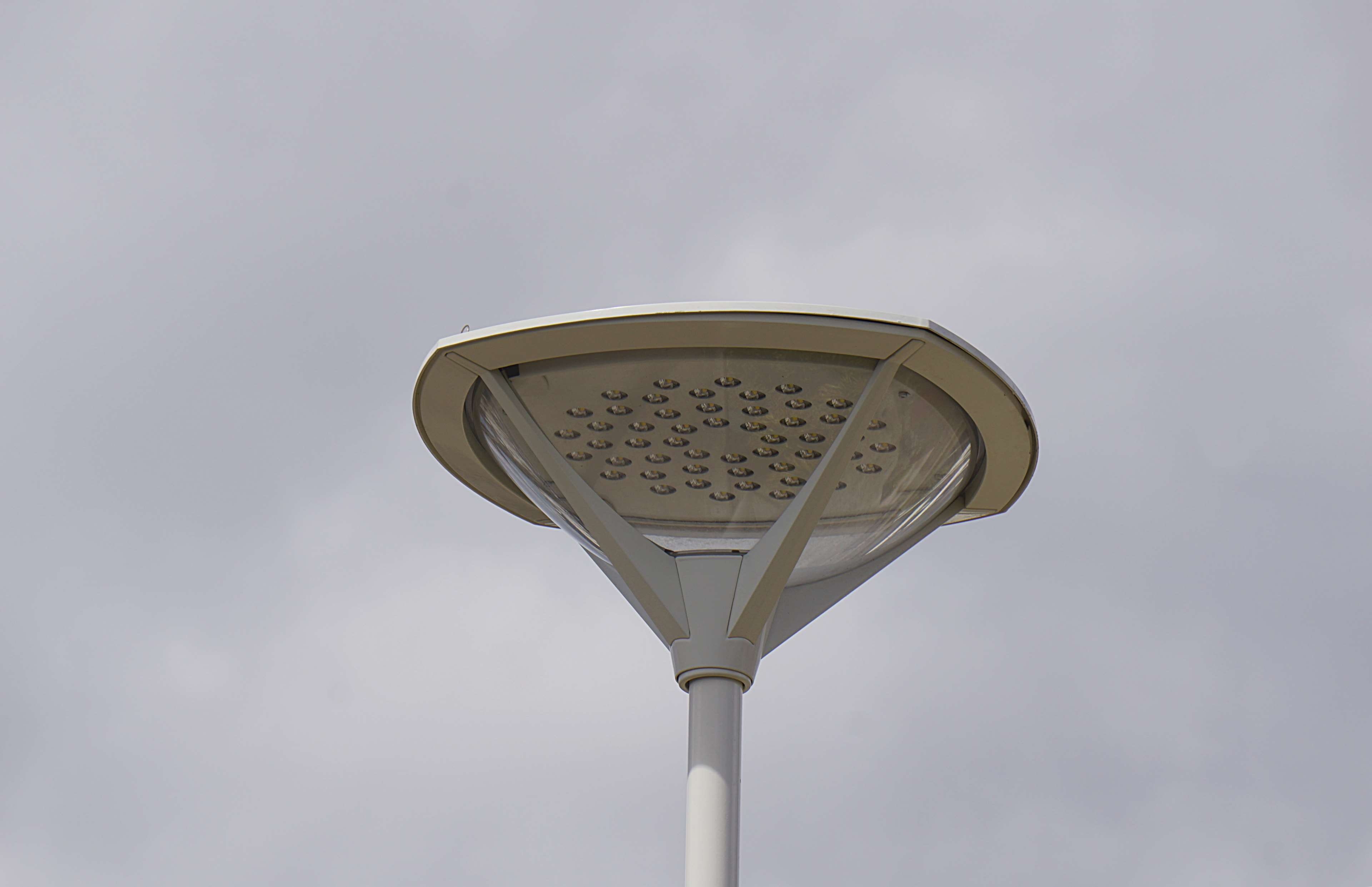 steel, lighting equipment, circle, street light, overcast, 4K, clairage public, outdoors, cloud - sky, gray, pattern, pole, urbain, built structure, sunlight, HD Wallpaper