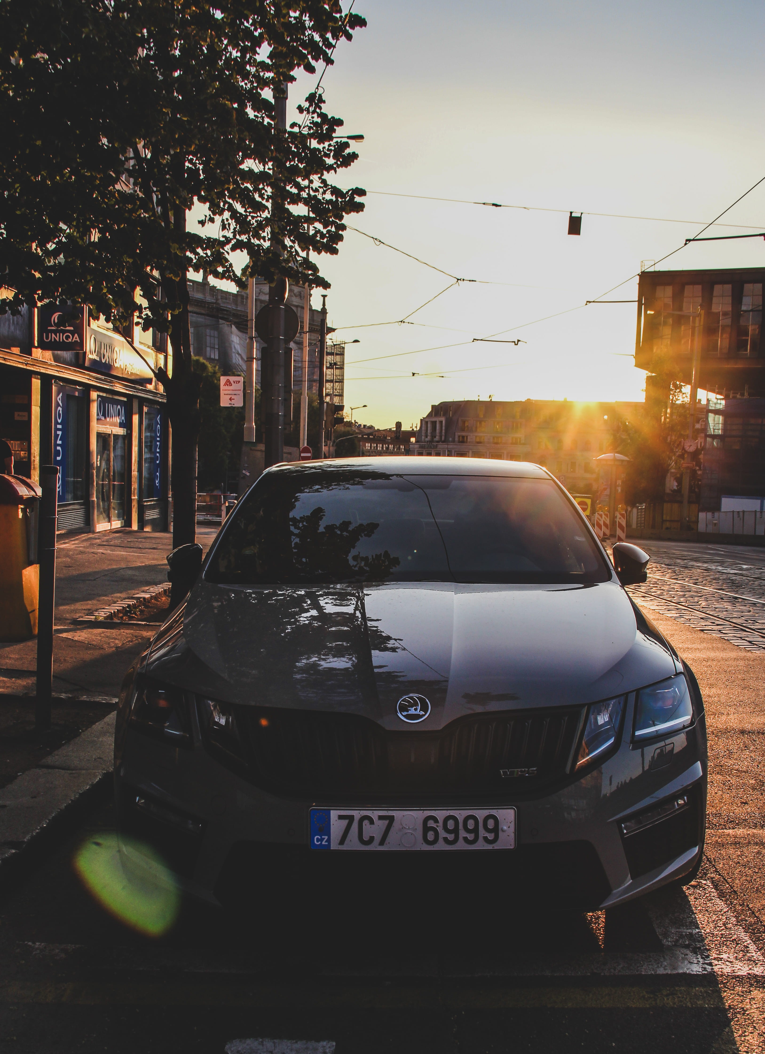 transportation, octavia rs, building exterior, sky, outdoors, sunset, cars, city street, prague, czech, mode of transportation, motor vehicle, plant, tree, Phone HD Wallpaper
