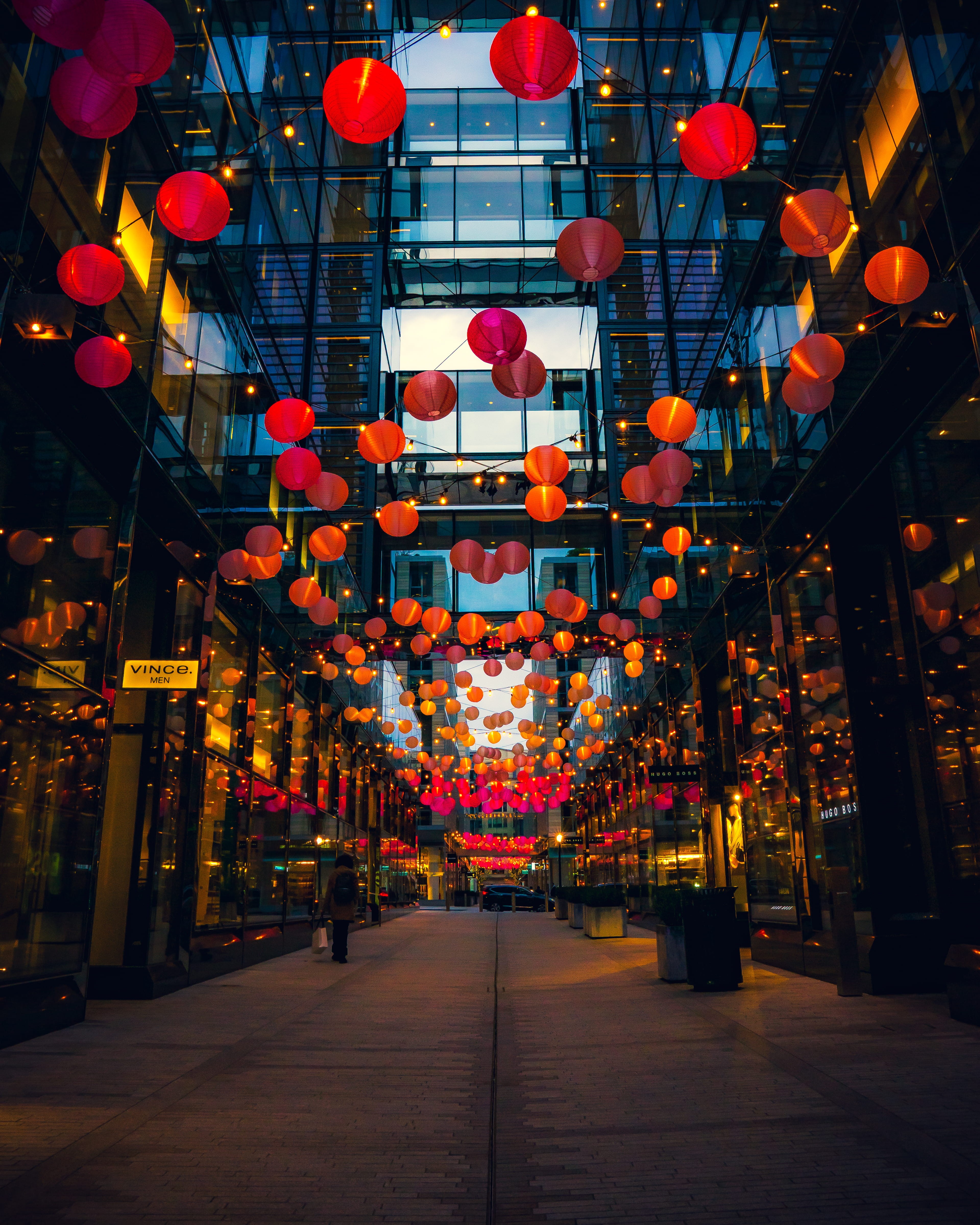 illuminated, person, festival, built structure, led, direction, bazaar, in a row, shop, outdoors, traffic light, arcade game machine, lighting, lampshade, Phone HD Wallpaper