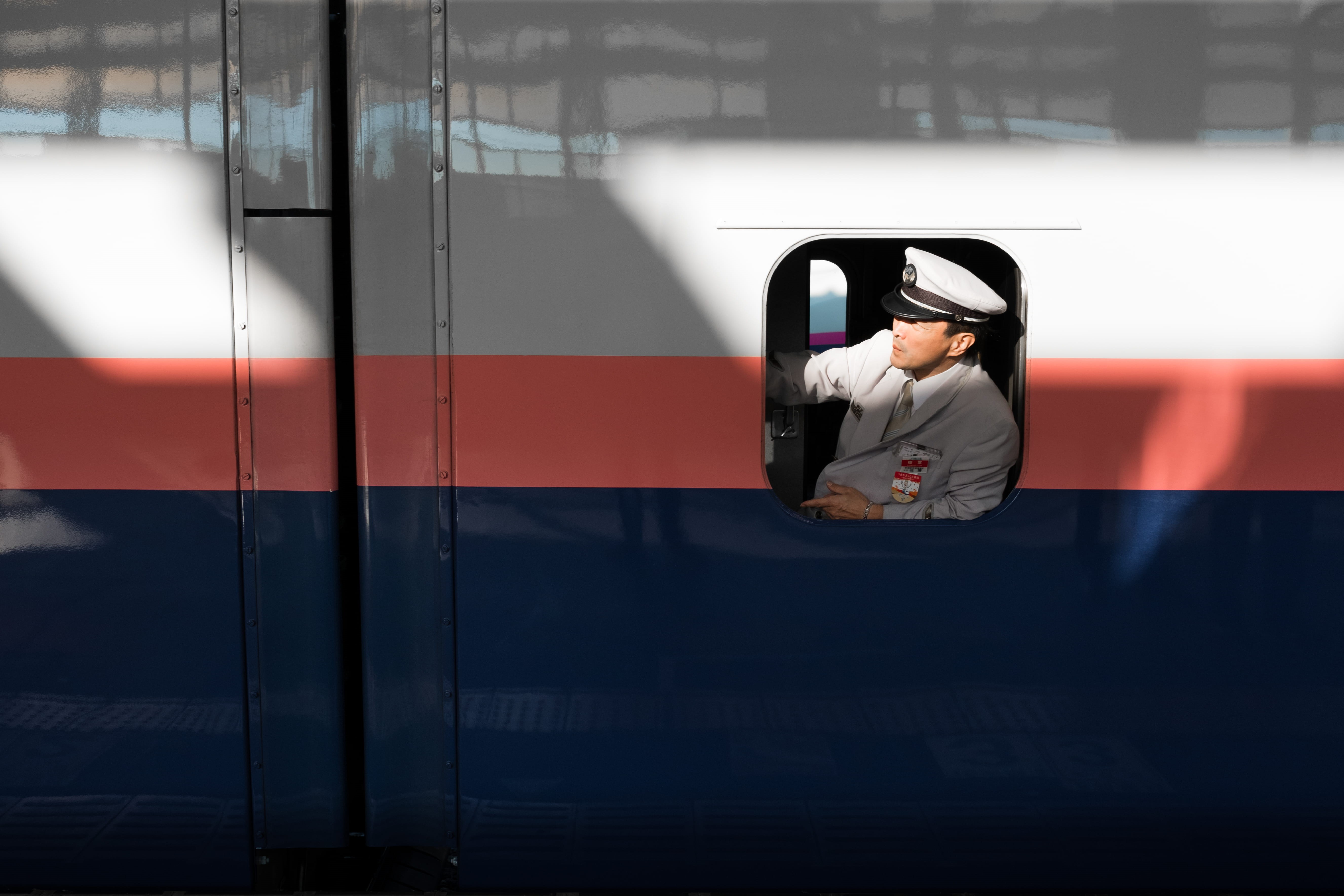 window, jacket, pilot, opened, blue, architecture, rail transportation, reflection, land vehicle, pink, controller, train, sitting, real people, outdoors, HD Wallpaper
