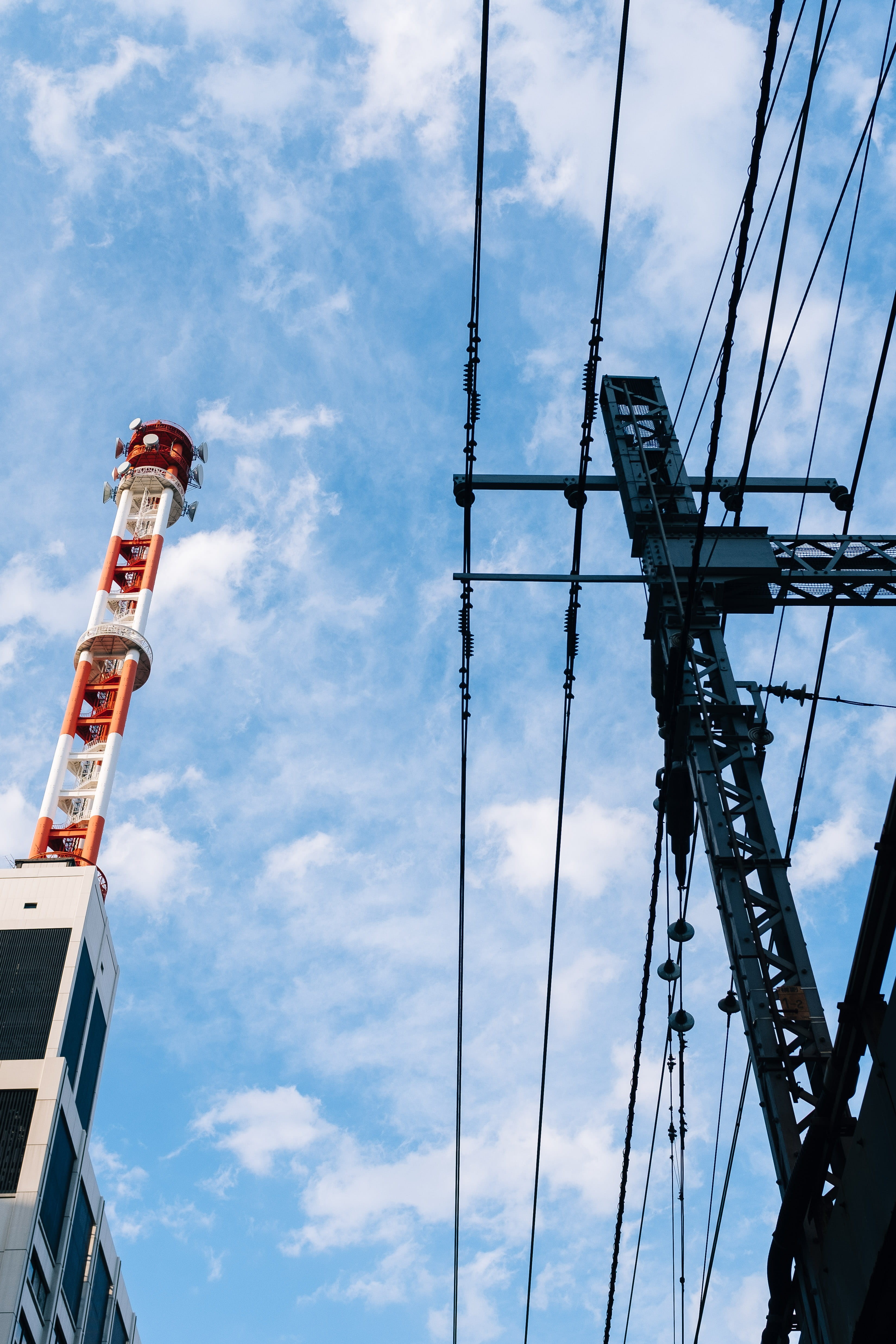 day, antenna, power supply, cloudy sky, architecture, low angle view, sky, industry, cables, metal, outdoors, blue, cloud - sky, electricity, tall - high, Phone HD Wallpaper