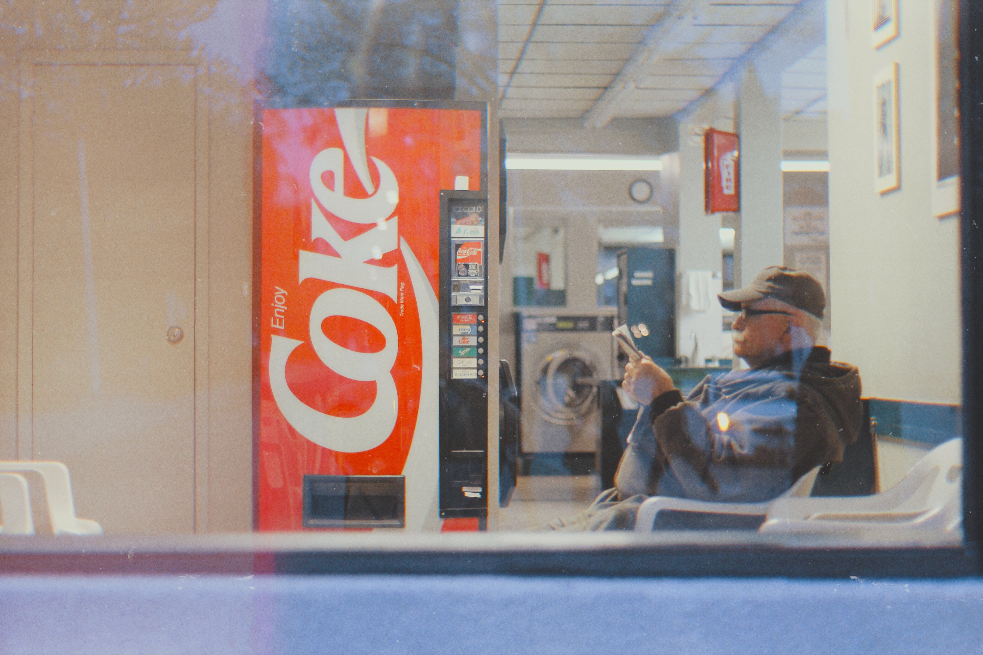 coat, coca, tire, window, restaurant, apparel, clothing, sitting, reflection, portrait, communication, people, spoke, 4K, adult, overcoat, men, real people, HD Wallpaper