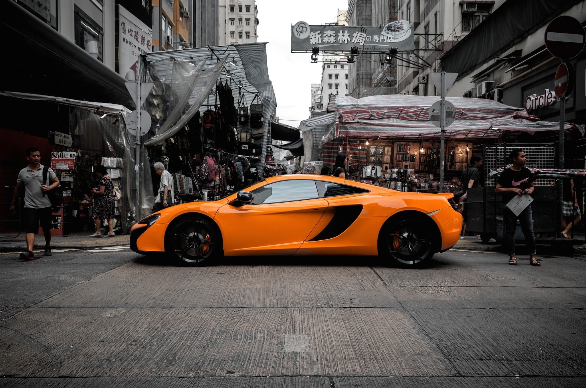 motor vehicle, along, transportation, supercar, outdoors, architecture, taxi, yellow taxi, road, speed, urban, kong, hong, maclaren, car, built structure, HD Wallpaper