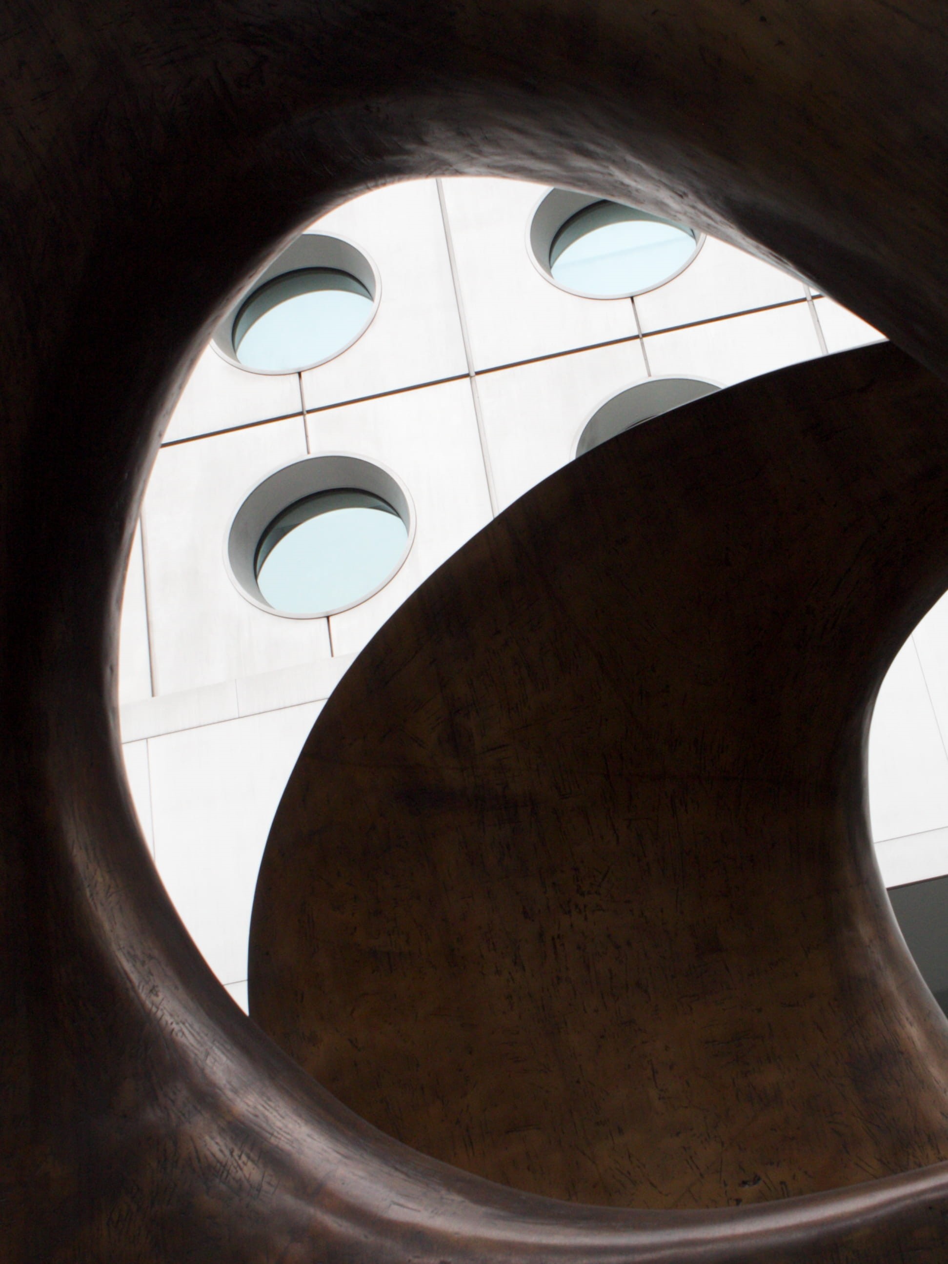 art, building, circle, transparent, built structure, jardine house, hongkong, close-up, design, geometric shape, 2K, day, sunlight, photoholgic, sky, high rise, Phone HD Wallpaper