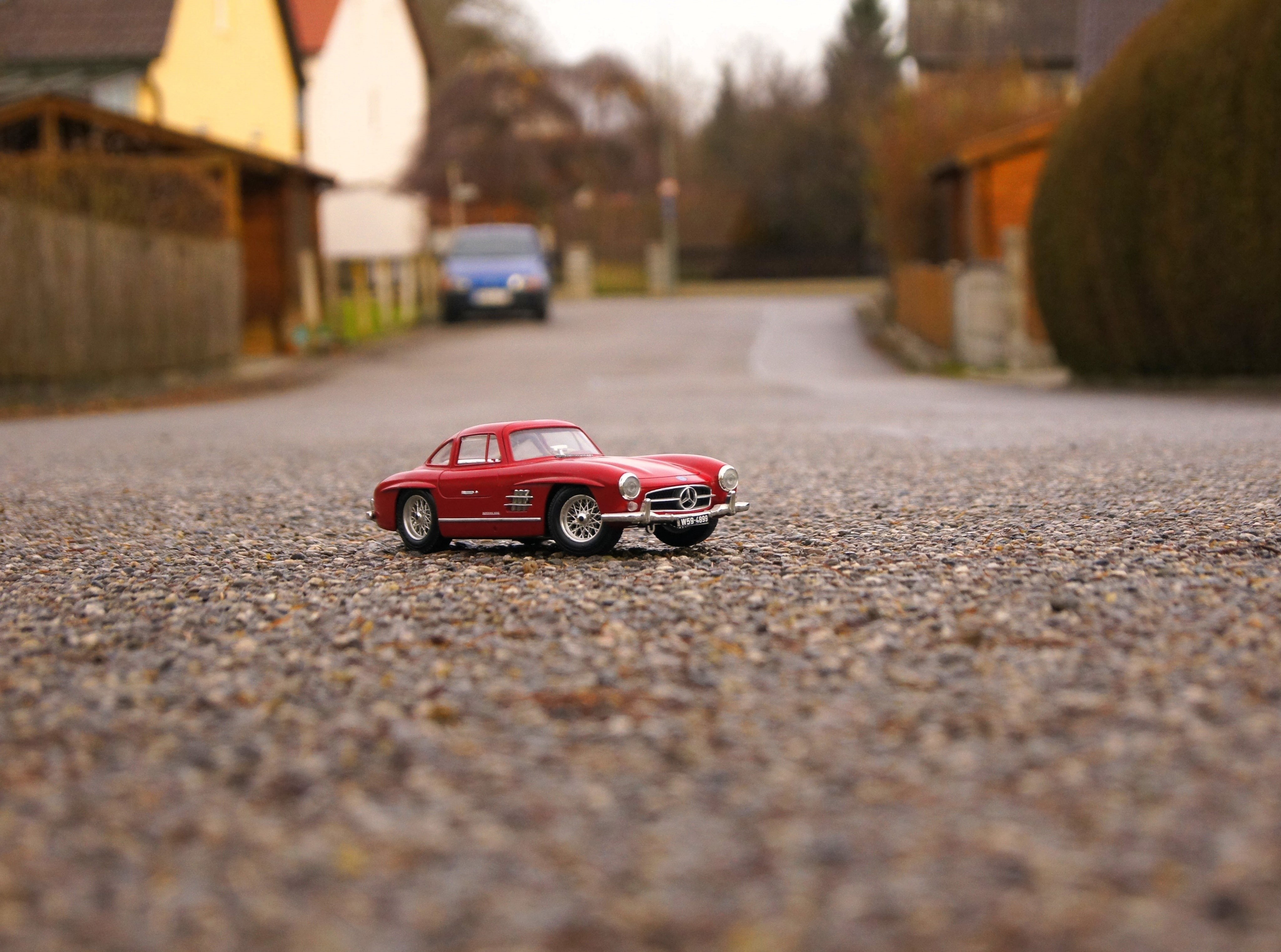asphalt, toy, mercedes-benz, surface level, mercedes, street, road, architecture, little, transportation, toy car, selective focus, city, plant, tilt-shift, HD Wallpaper