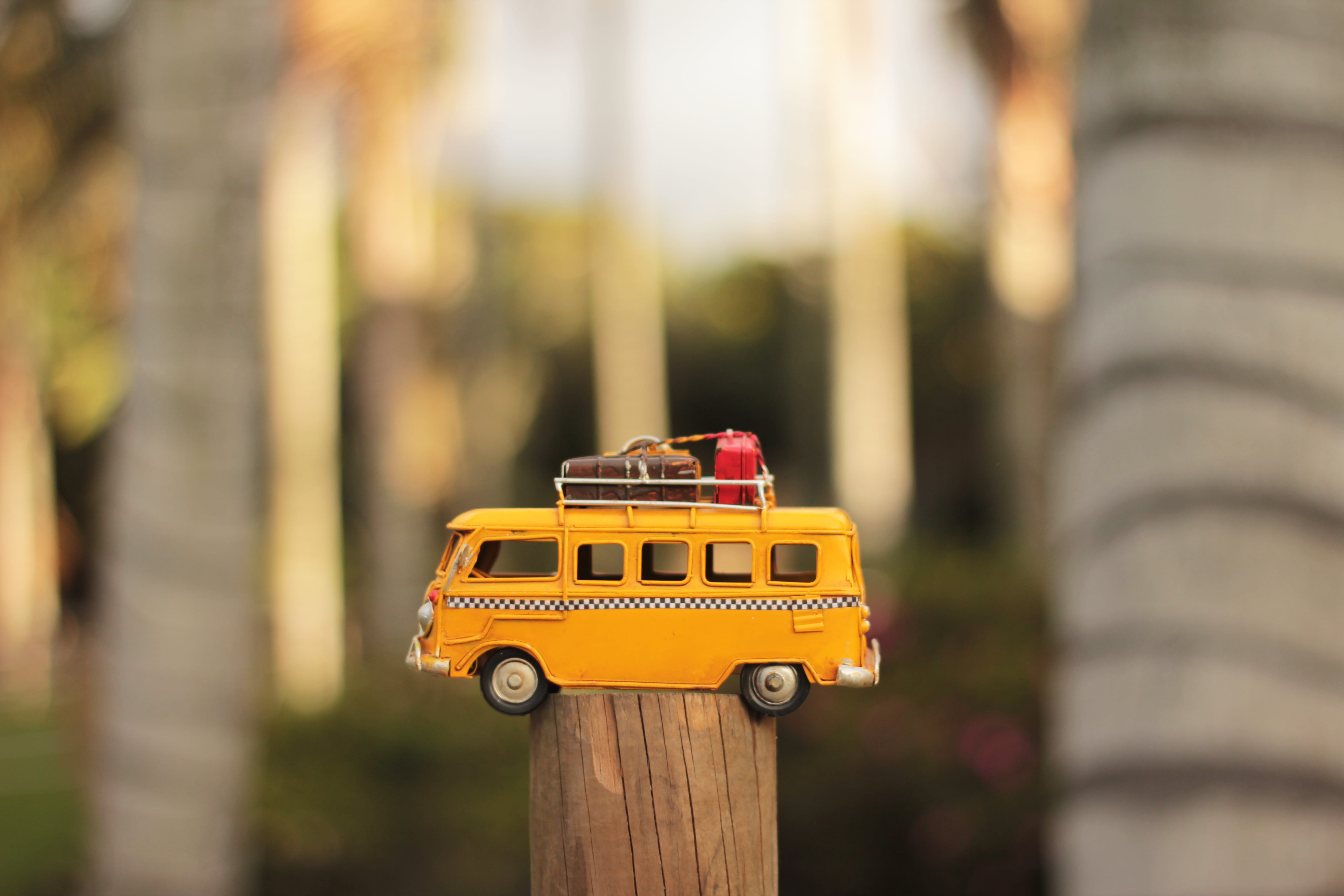 focus on foreground, model, small, van, macro, car, yellow, technology, outdoors, 5K, built structure, day, nature, RV, wood - material, die, camper, architecture, HD Wallpaper