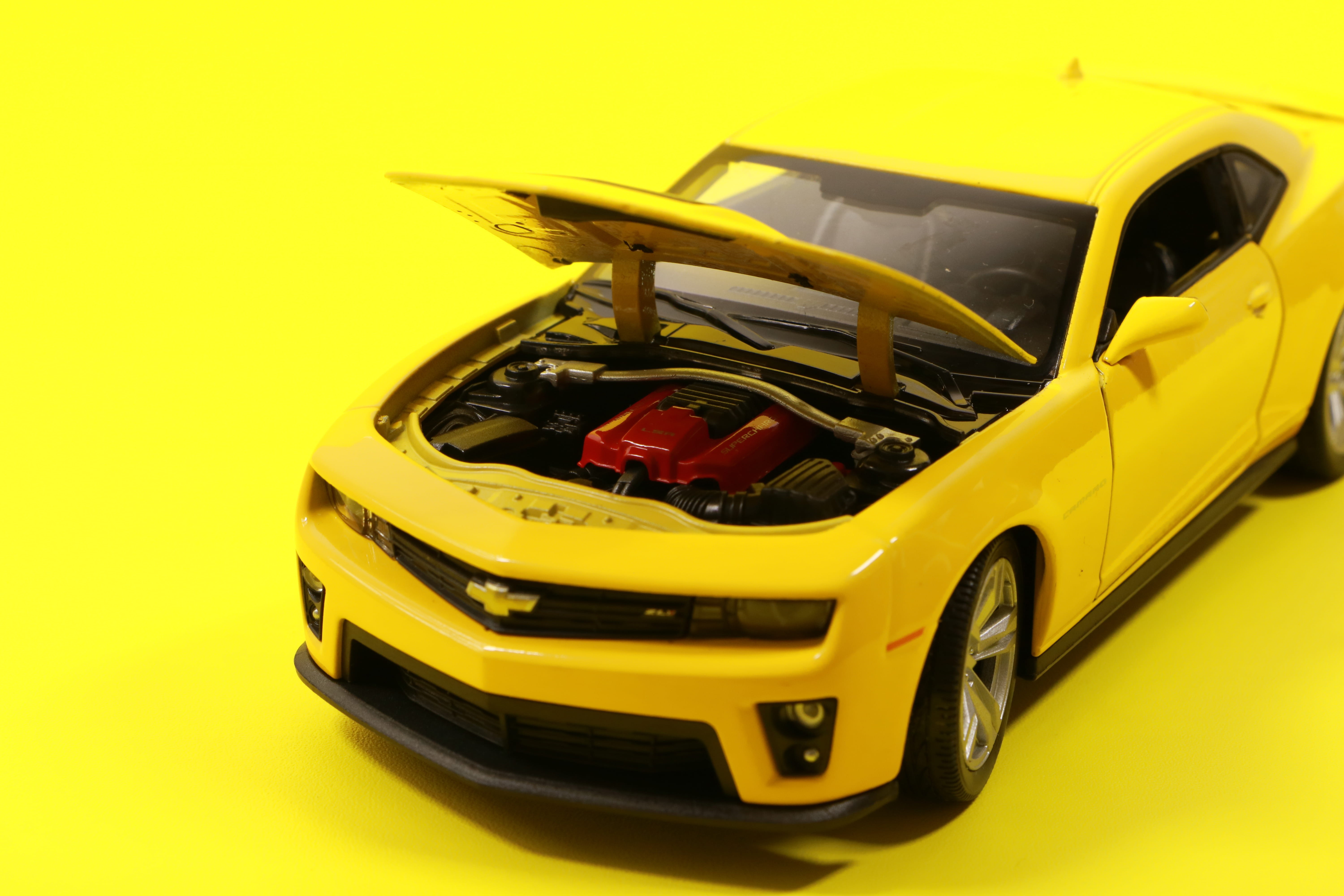 yellow background, mode of transportation, 5K, car, die-cast, diecast, colored background, travel, camaro, die, miniature, transportation, automotive, HD Wallpaper
