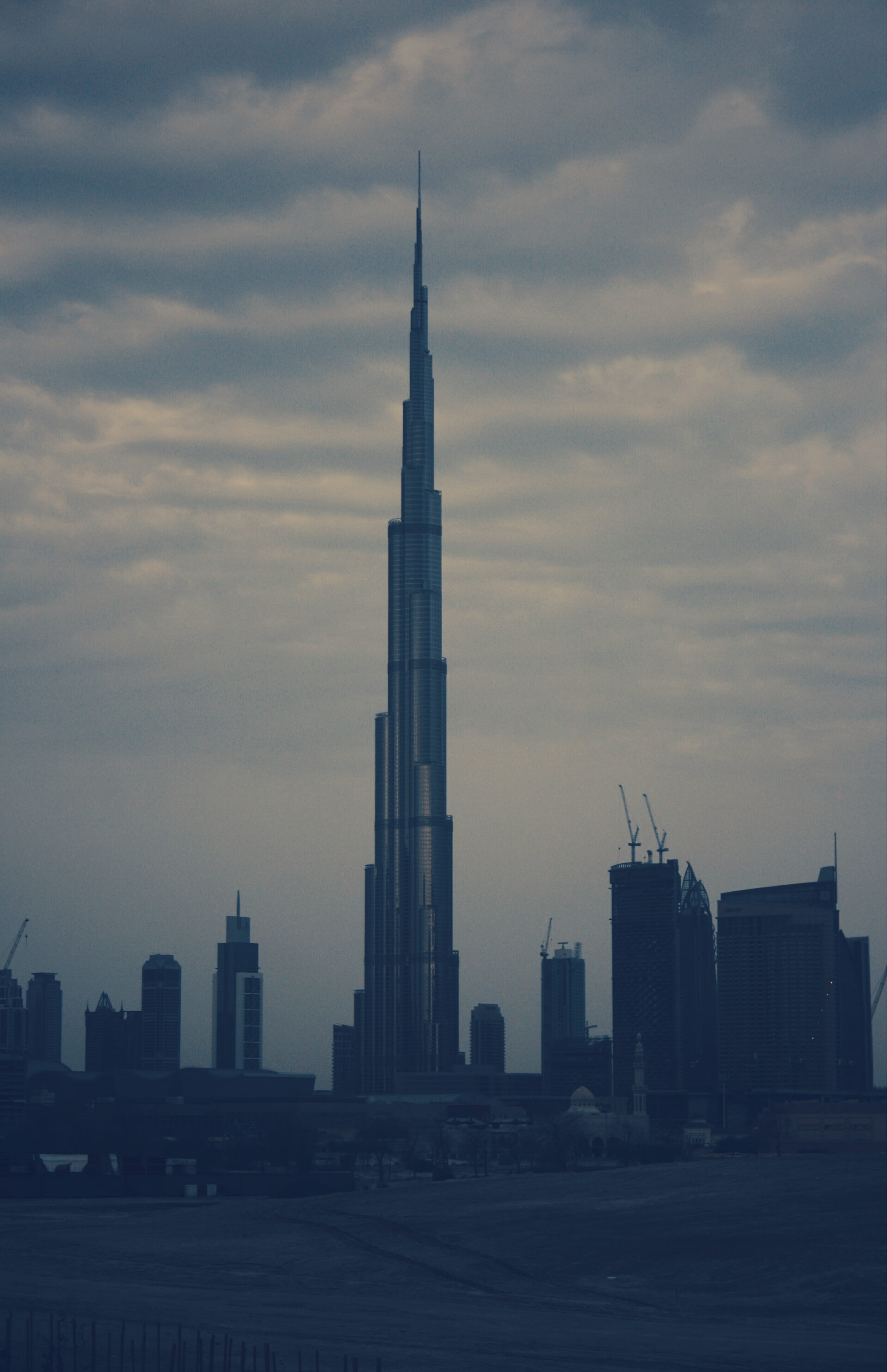 no people, skyscraper, financial district, landscape, tall - high, city, spire, sky, tower, building, cloud - sky, 4K, built structure, urban skyline, Phone HD Wallpaper
