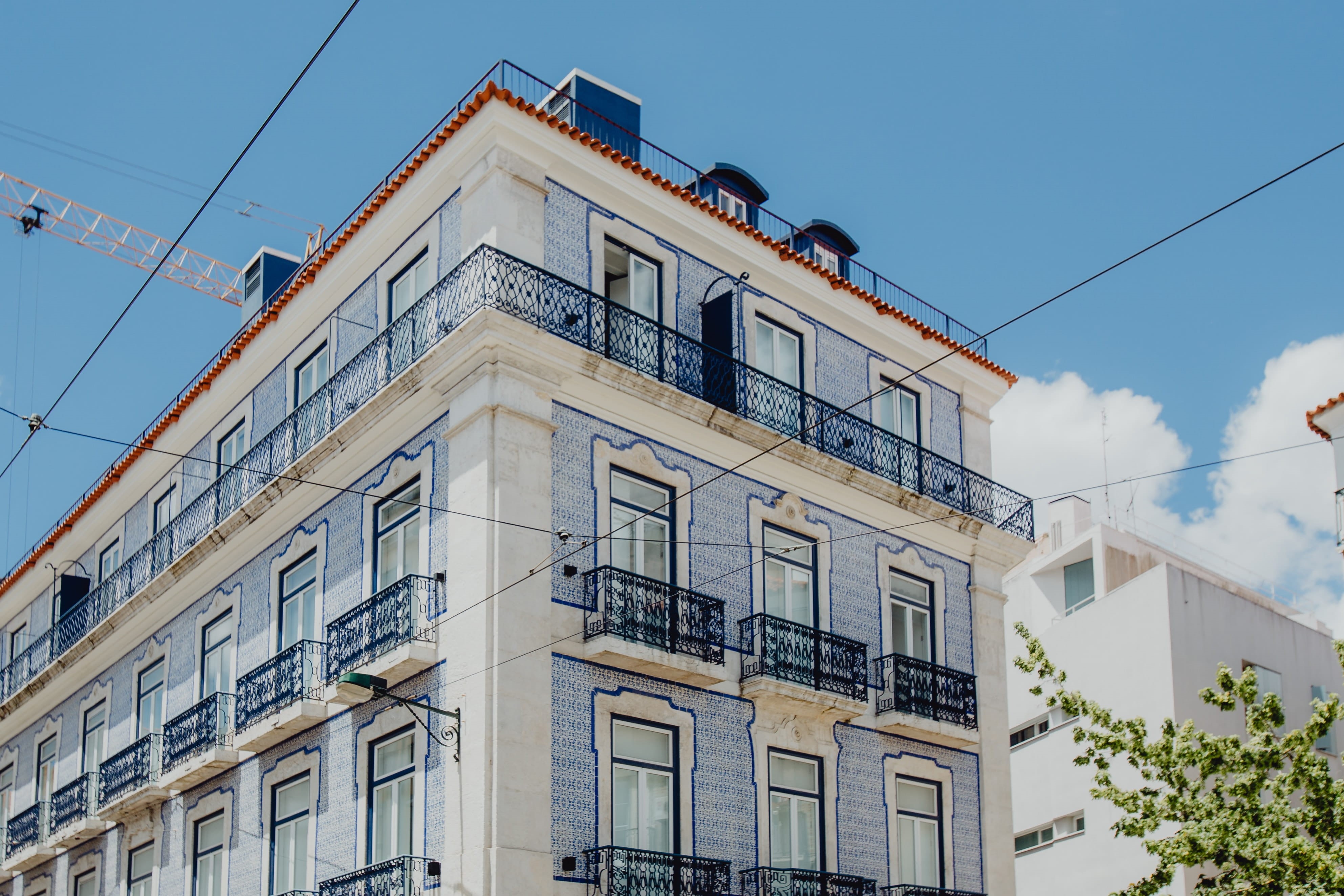 lisboa, buildings, house, Europe, 4K, no people, building exterior, day, portugal, town, cityscape, cable, sky, building, window, low angle view, clear sky, HD Wallpaper