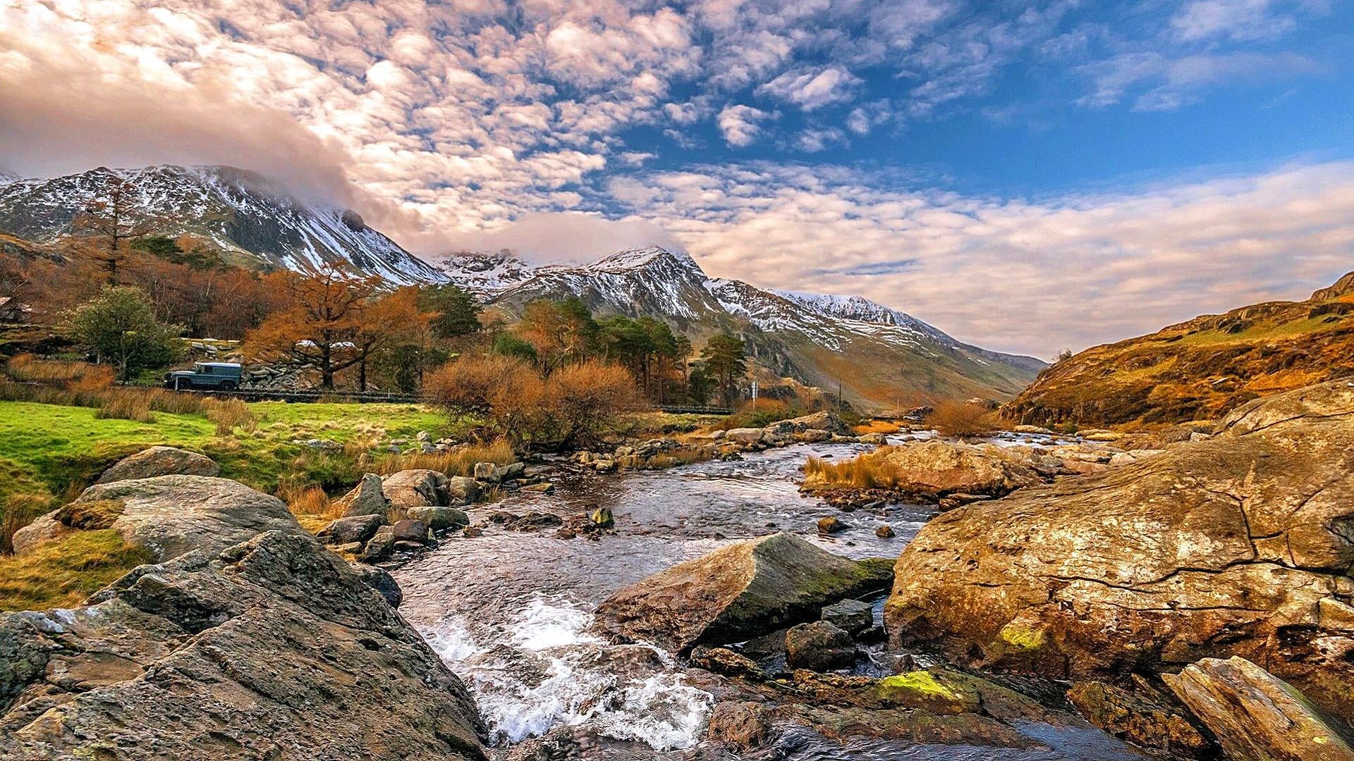wilderness, snowcapped mountain, 1080P, plant, rock, water, stream, snow, united kingdom, travel, cloud - sky, sunrise, river, national park, sky, solid, HD Wallpaper