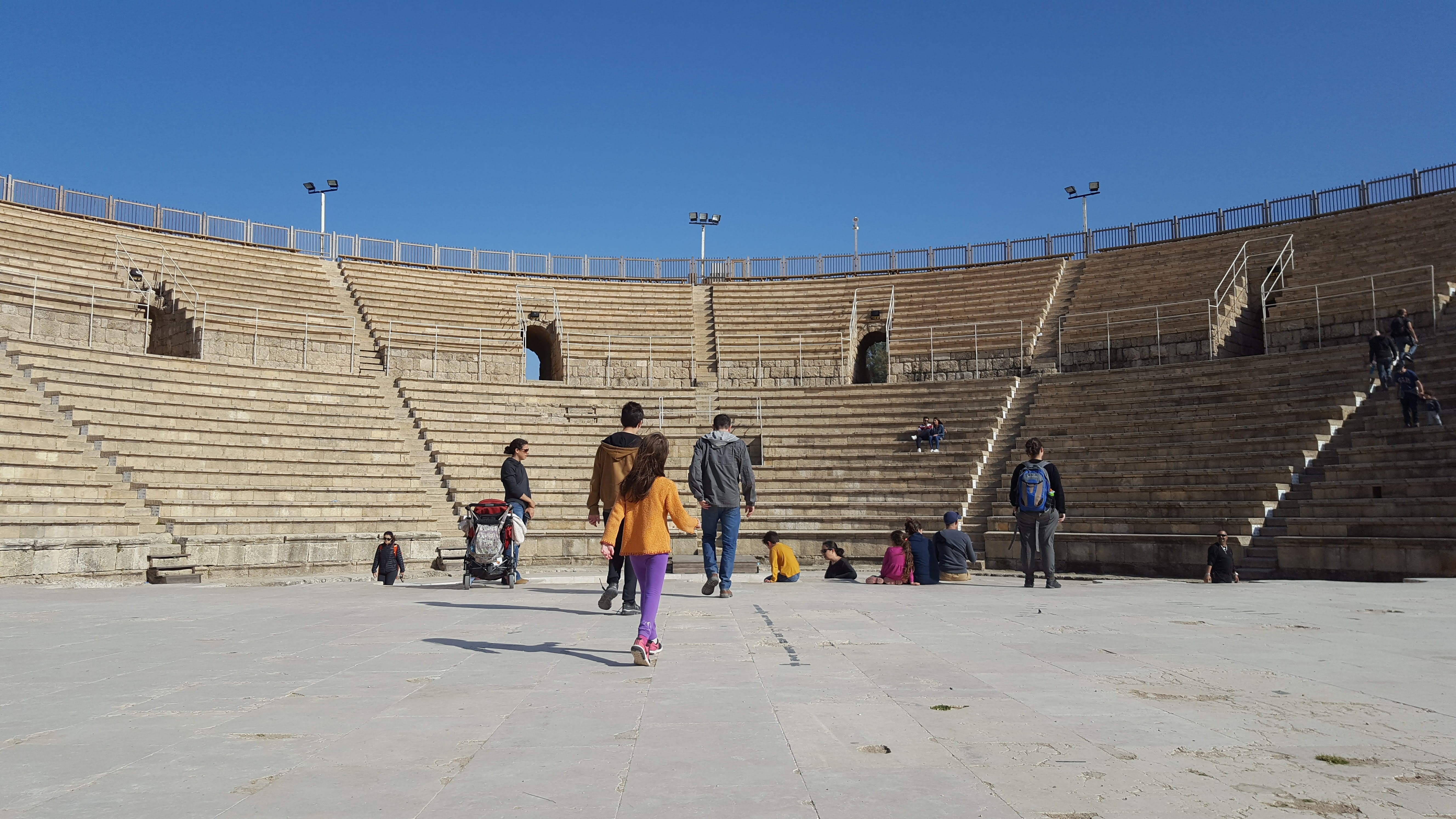 travel destinations, clear sky, building exterior, amphitheatre, real people, roman, architecture, steps and staircases, history, ancient, sky, women, outdoors, HD Wallpaper