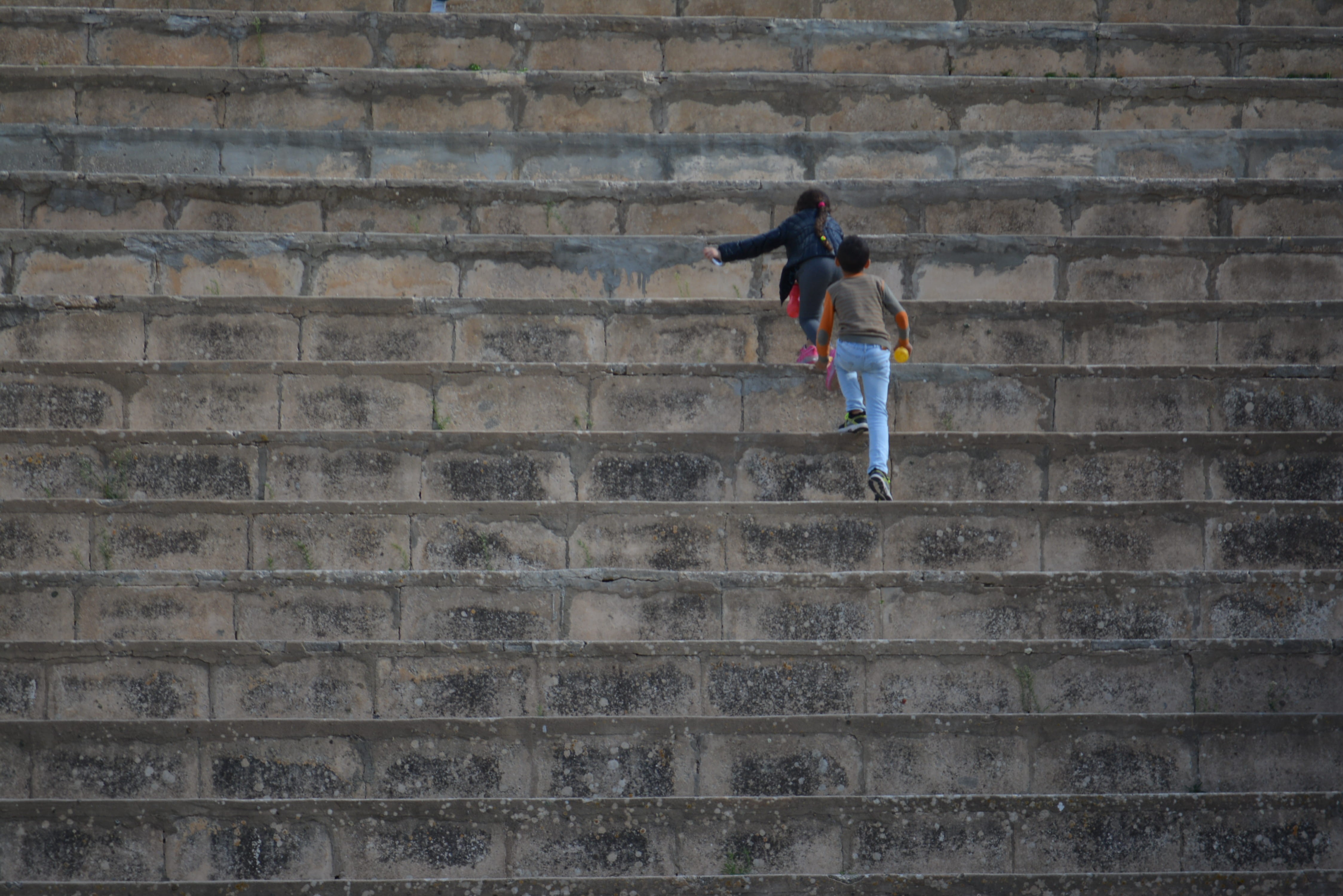 wall, tunisia, youth, young, stairs, 4K, staircase, real people, brick, vitality, amphitheatre, full length, roman, clothing, outdoors, wall - building feature, HD Wallpaper