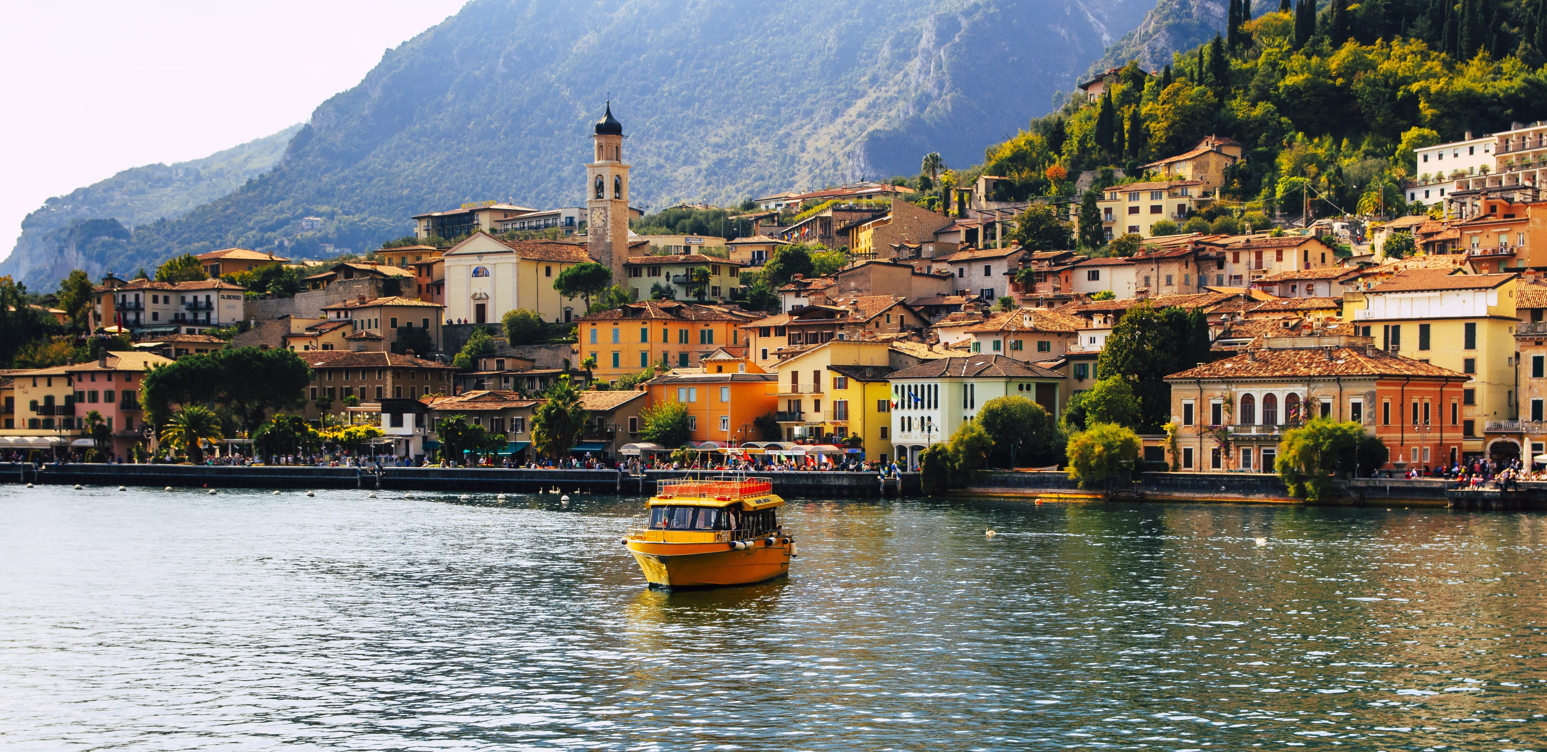 boat, city, place of worship, architecture, residential district, italian, lake, water, town view, garda, travel destinations, homes, mountain range, cityscape, HD Wallpaper