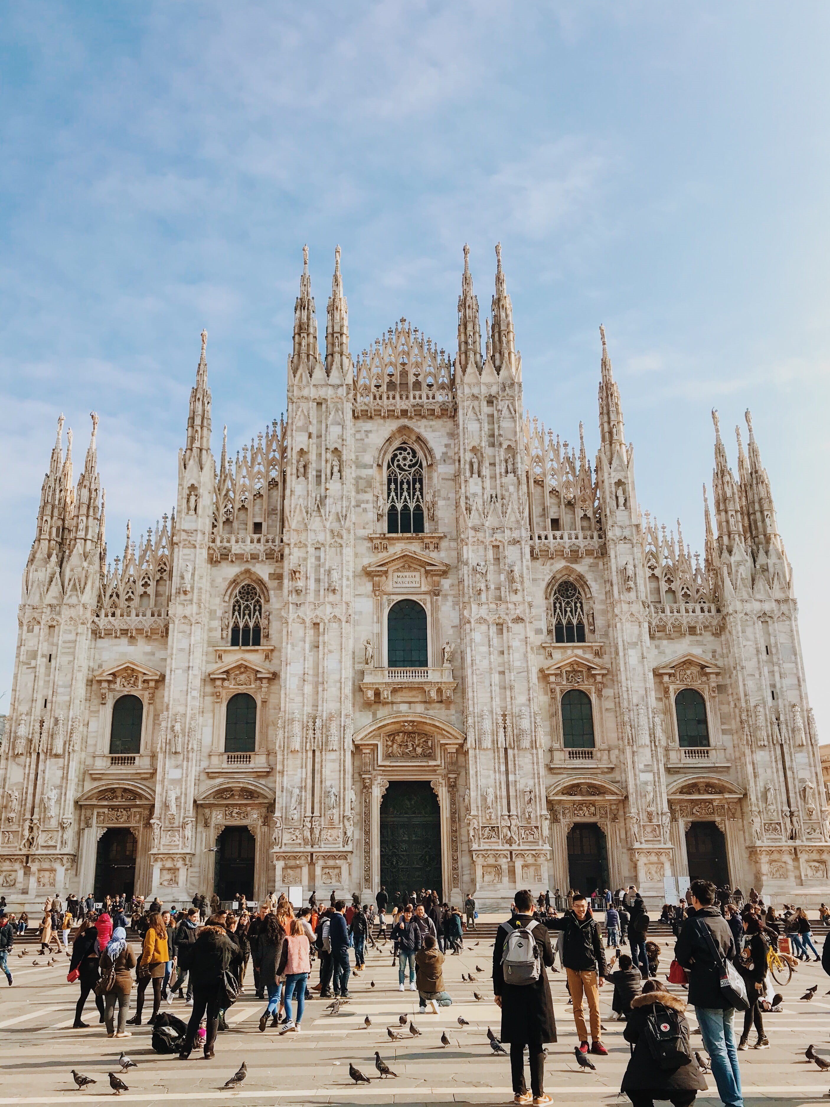 catherdral, sky, lifestyles, travel, 2K, milan cathedral, walking, built structure, real people, outdoors, people, building exterior, women, religion, Phone HD Wallpaper