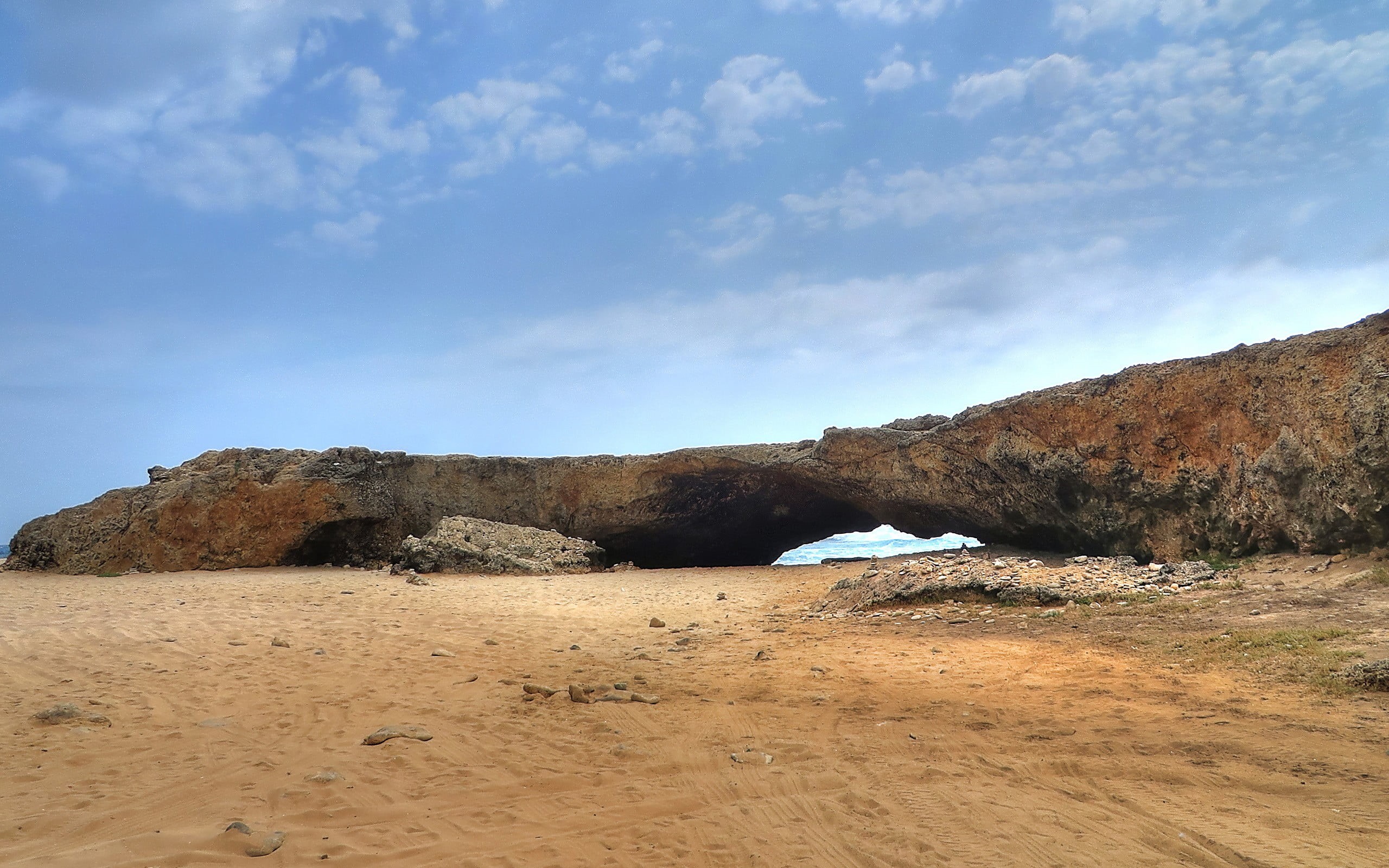 tranquil scene, Natural Bridge, white, building, climate, 2K, concrete, beauty in nature, land, rock formation, water, cloud - sky, beach, Aruba, sand, HD Wallpaper