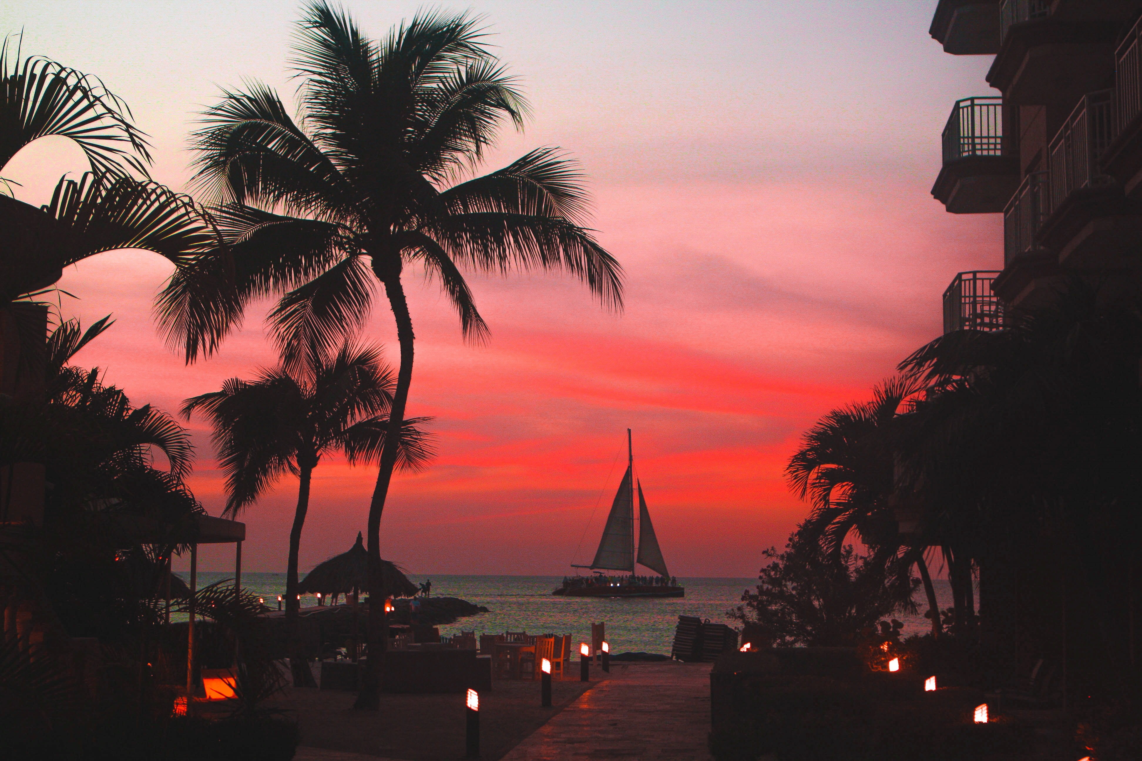 tranquility, sunset, nature, sea, architecture, cloud - sky, sailboat, silhouette, tropical climate, noord, palm tree, plant, travel destinations, beach, HD Wallpaper