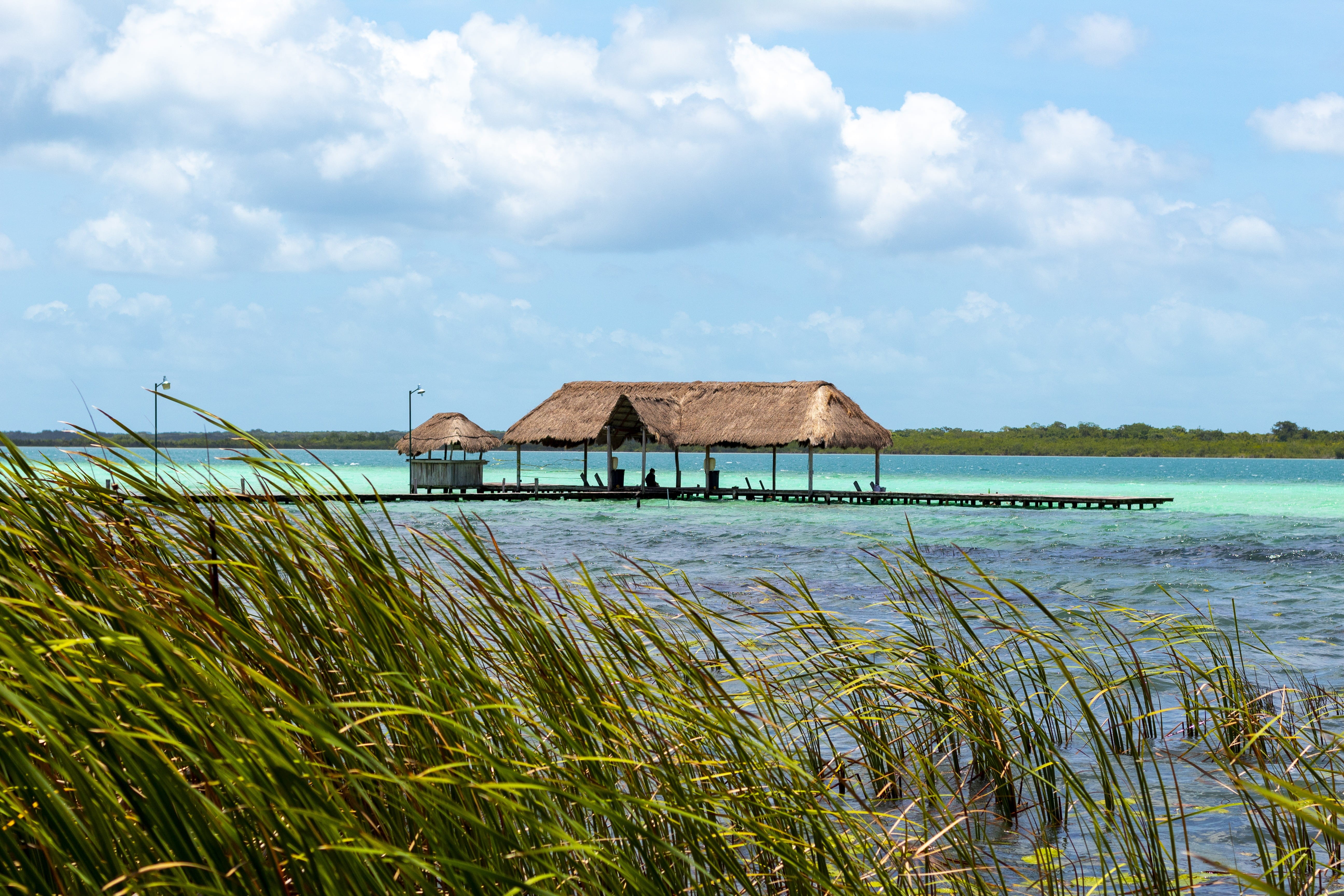 grass, cloud - sky, day, architecture, house, lake, laguna, sea, outdoors, bacalar, water, building, holiday, palapa, no people, 5K, nature, scenics - nature, HD Wallpaper