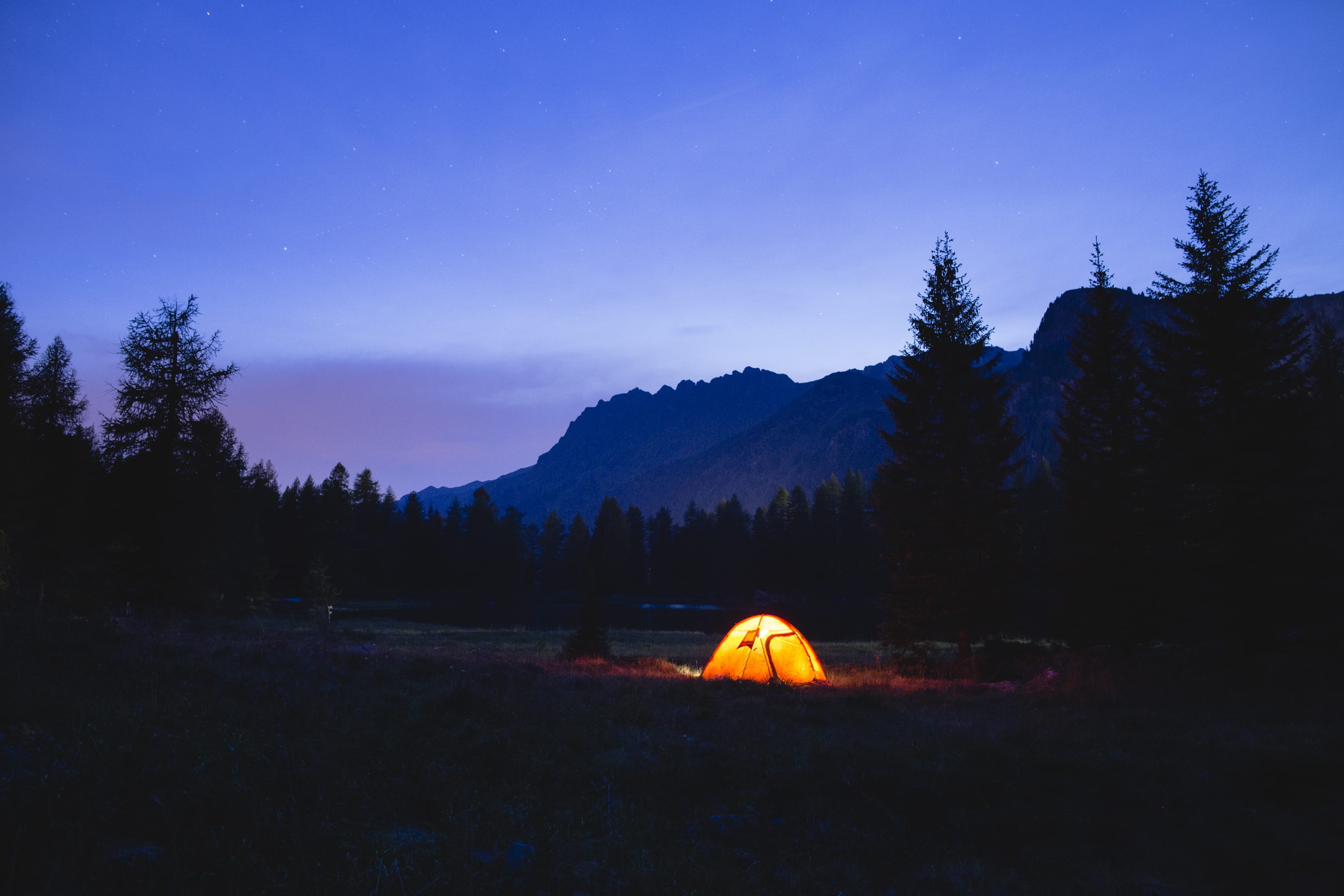 land, no people, glowing, dome, mountain, camping, trees, sky, pine, beside, orange color, bonfire, 2K, blue, woodland, idyllic, tent, silhouette, night, HD Wallpaper