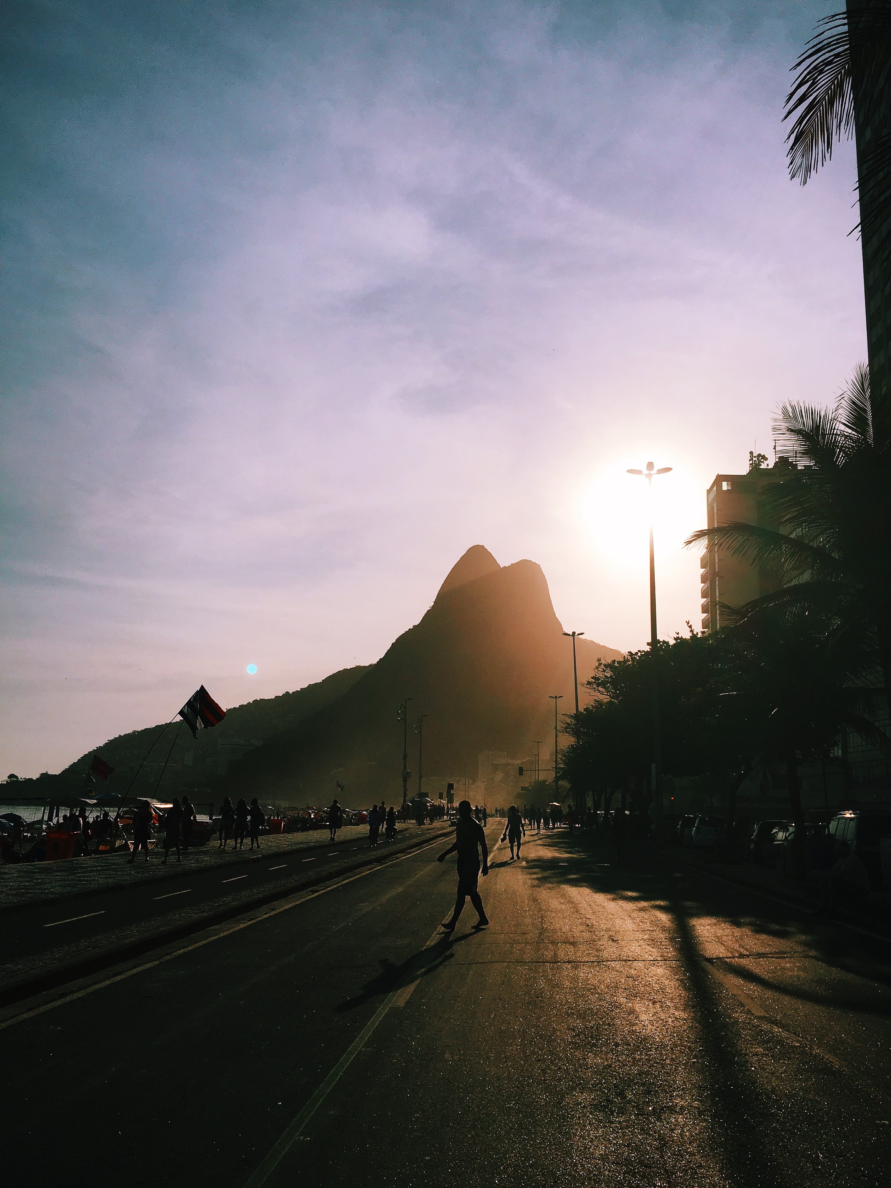direction, real people, sky, sunshine, city, architecture, plant, sunset, nature, people, morro dois irmãos, mode of transportation, 4K, street, sunrise, Phone HD Wallpaper