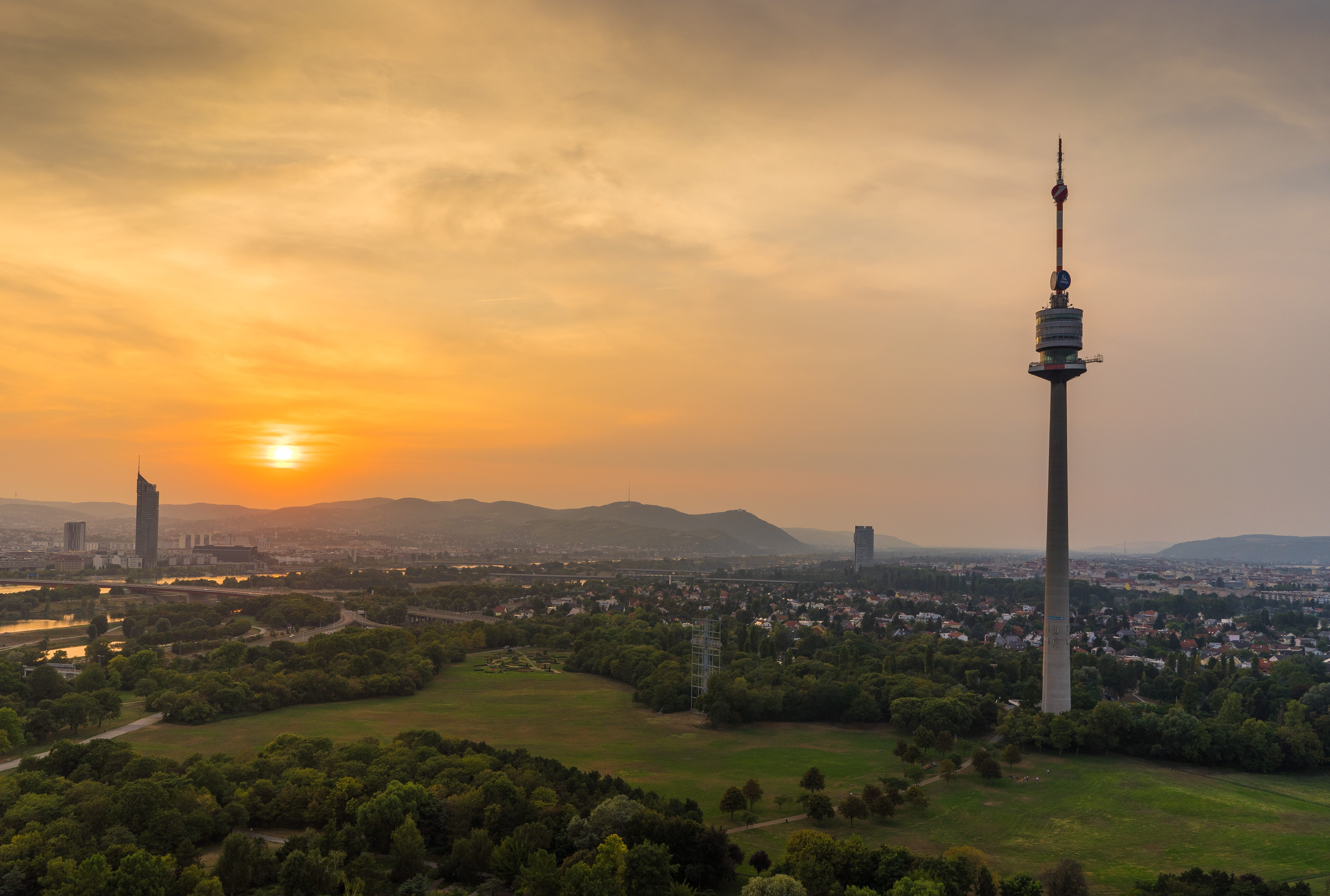 spire, sky, nature, hills, skyscraper, building exterior, no people, modern, orange, austria, architecture, city, tourism, cloud - sky, sunset, cityscape, HD Wallpaper