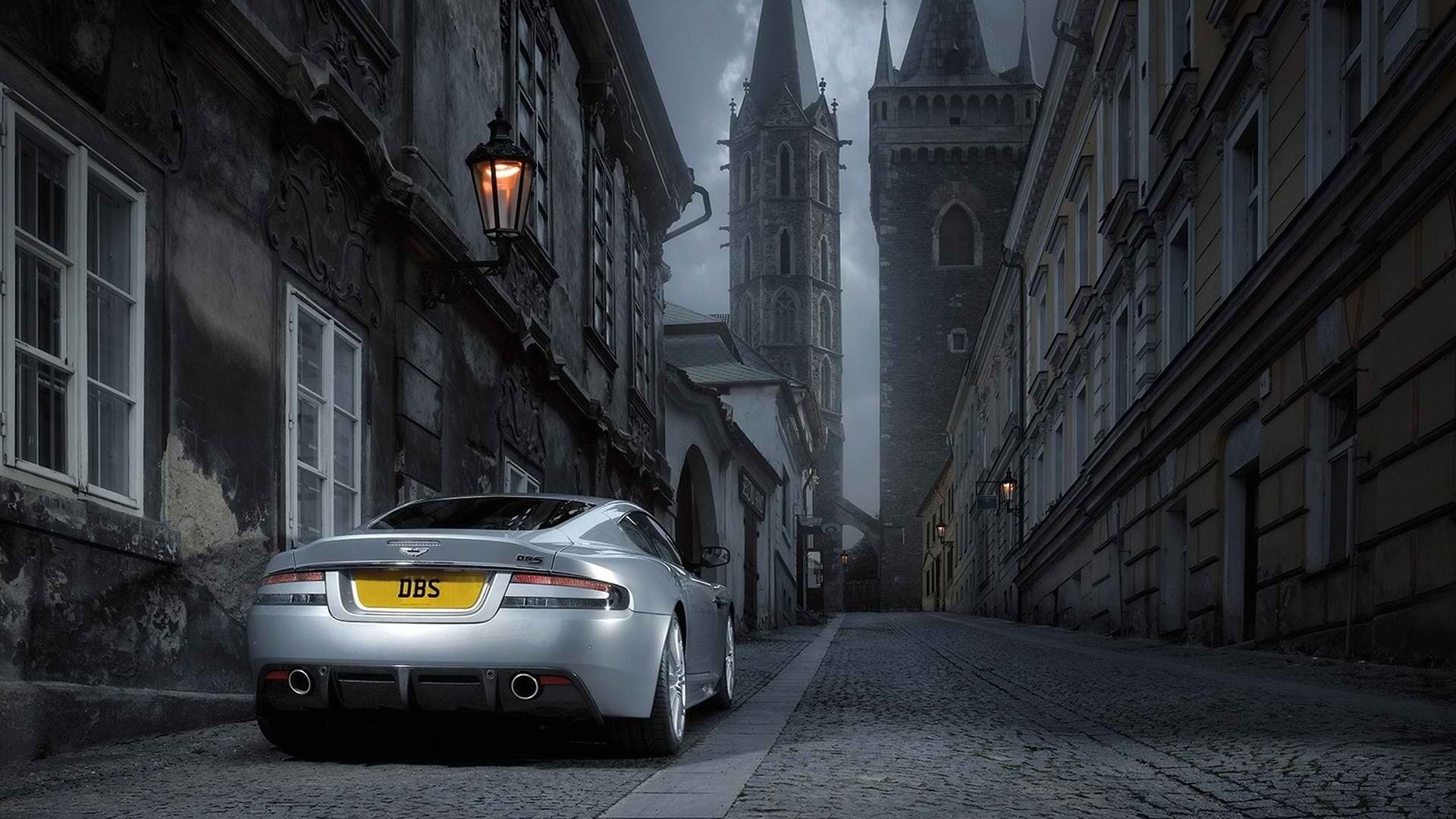 transportation, city, social issues, sign, Aston Martin DBS, outdoors, 1080P, cityscape, mode of transportation, night, built structure, crime, city street, HD Wallpaper