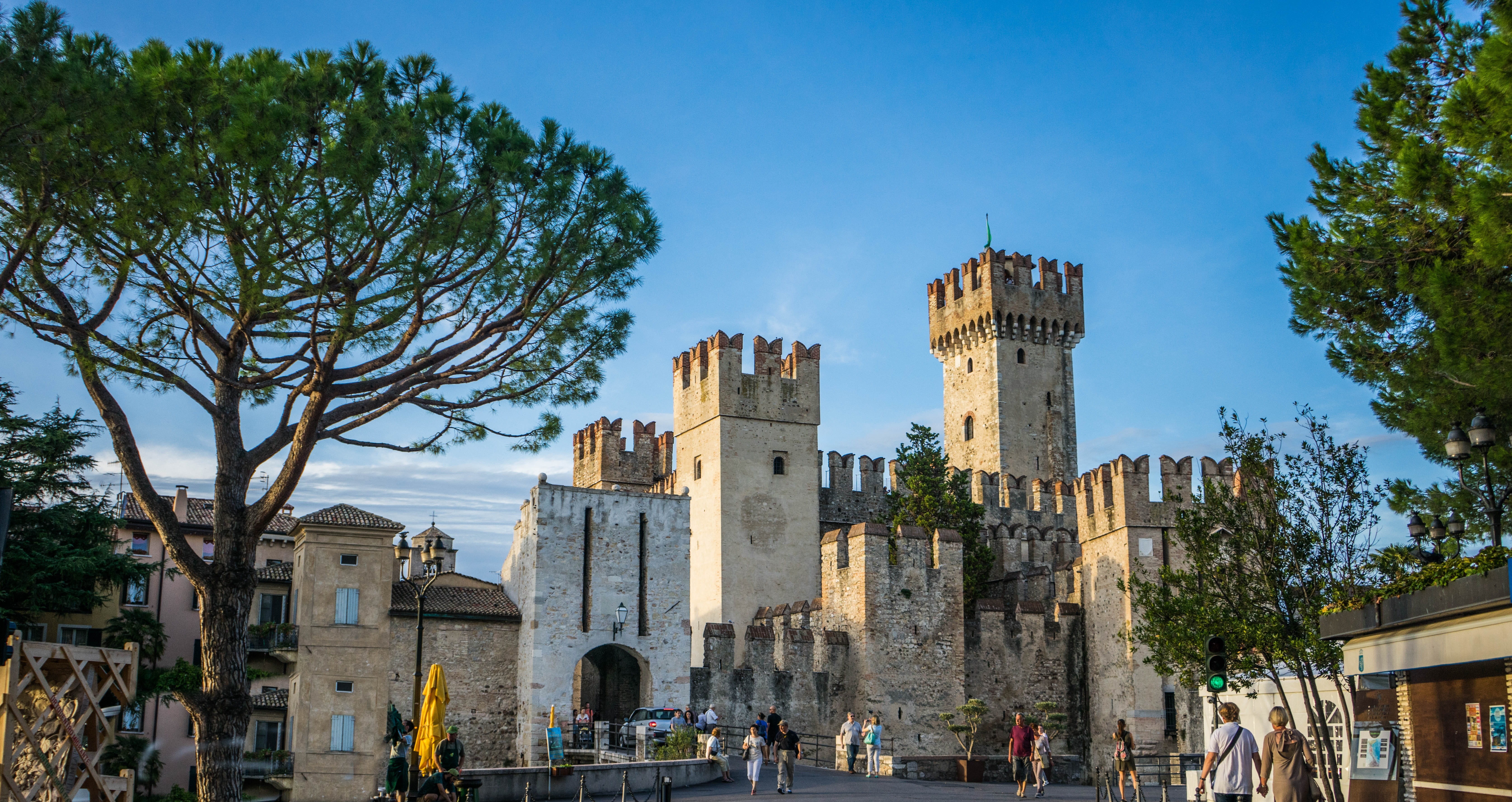 sky, group of people, real people, the past, lake garda, history, city, incidental people, built structure, architecture, landmark, italy, architectural column, HD Wallpaper