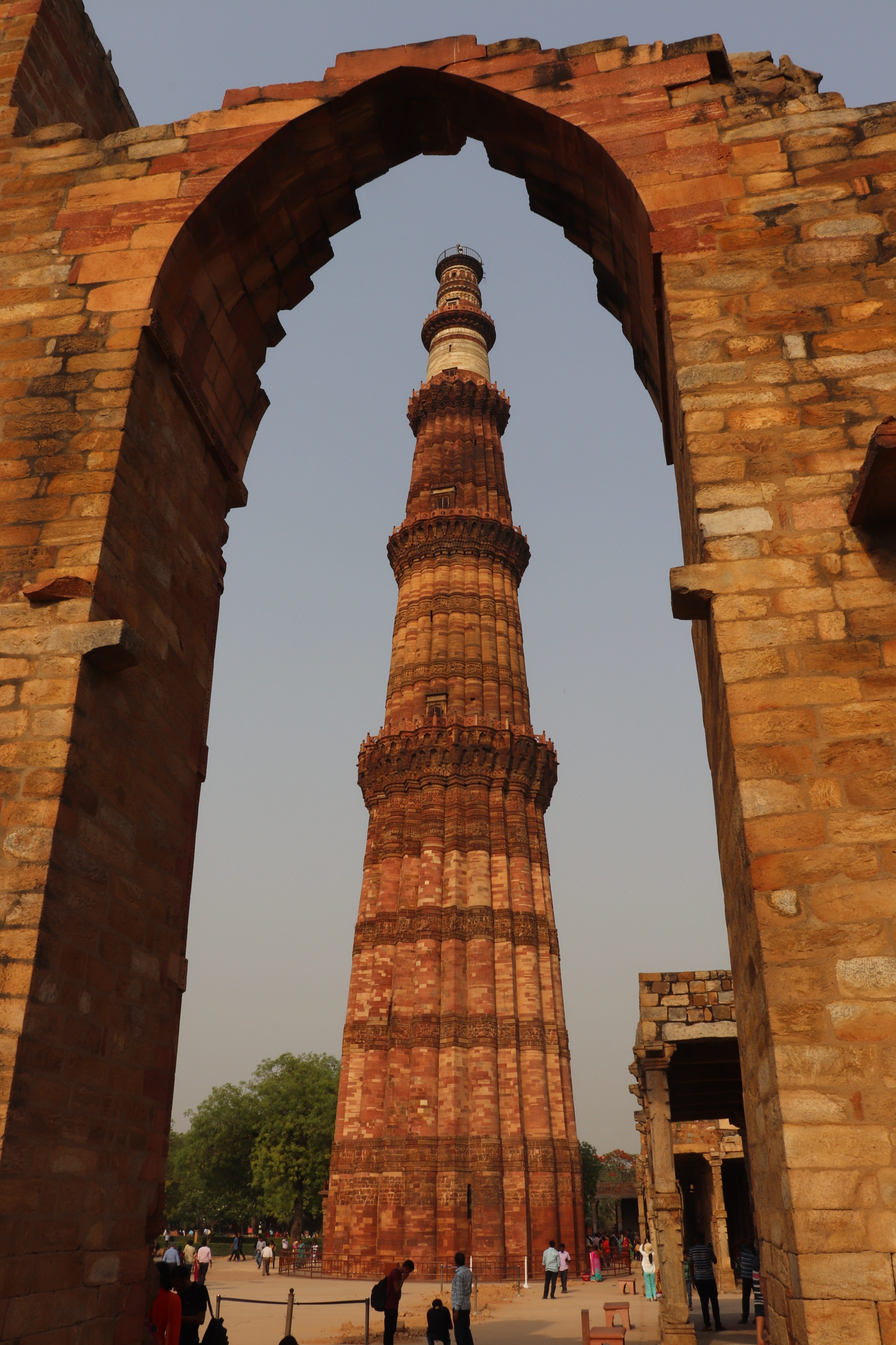 unesco world heritage site, group of people, low angle view, travel, qutub minar, ancient, nature, stone, building exterior, architectural column, mughal, Phone HD Wallpaper
