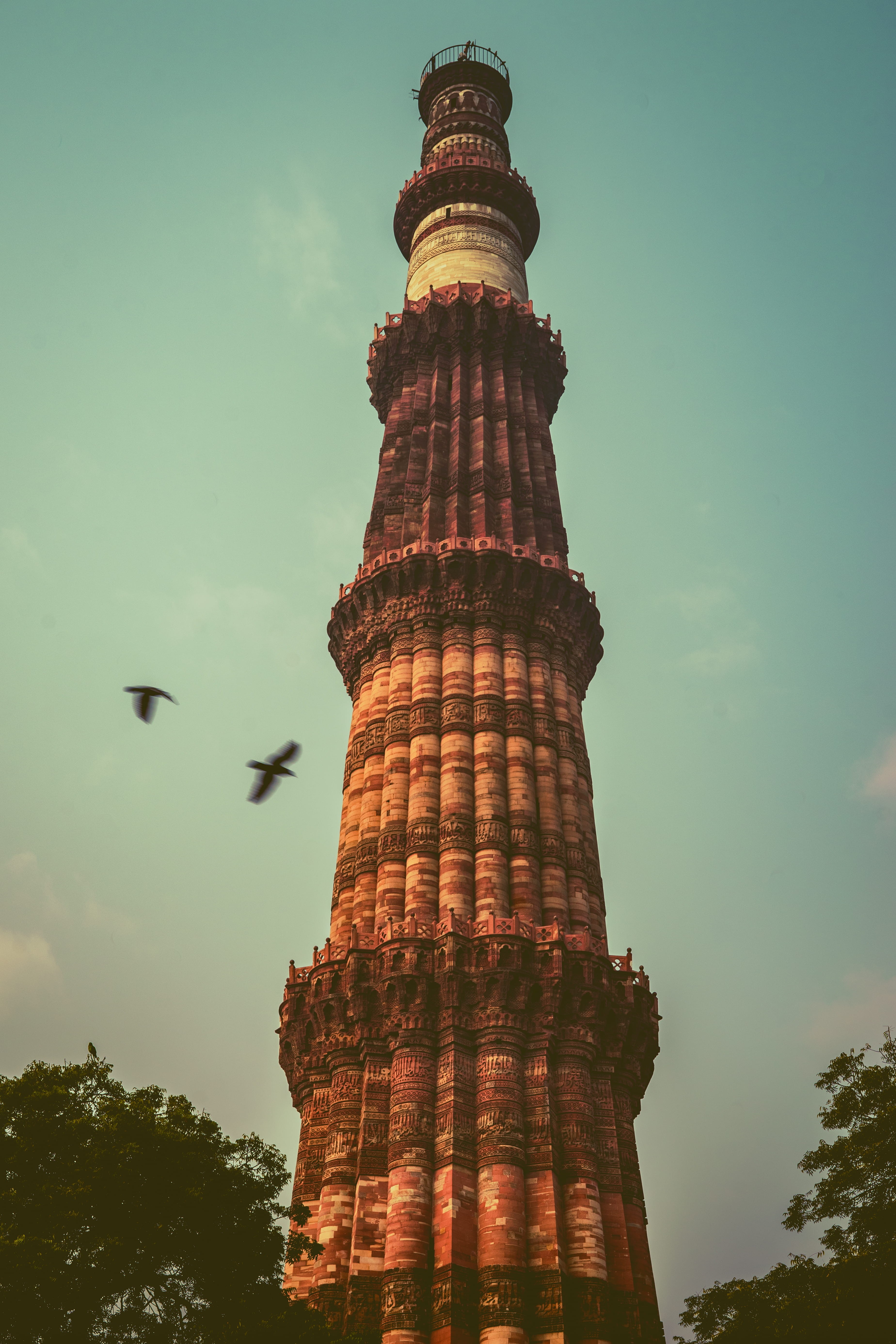 india, outdoors, travel destinations, sky, steeple, flying, blue, qutub minar, monument, lighthouse, tower, no people, structure, old, day, building, 5K, Phone HD Wallpaper
