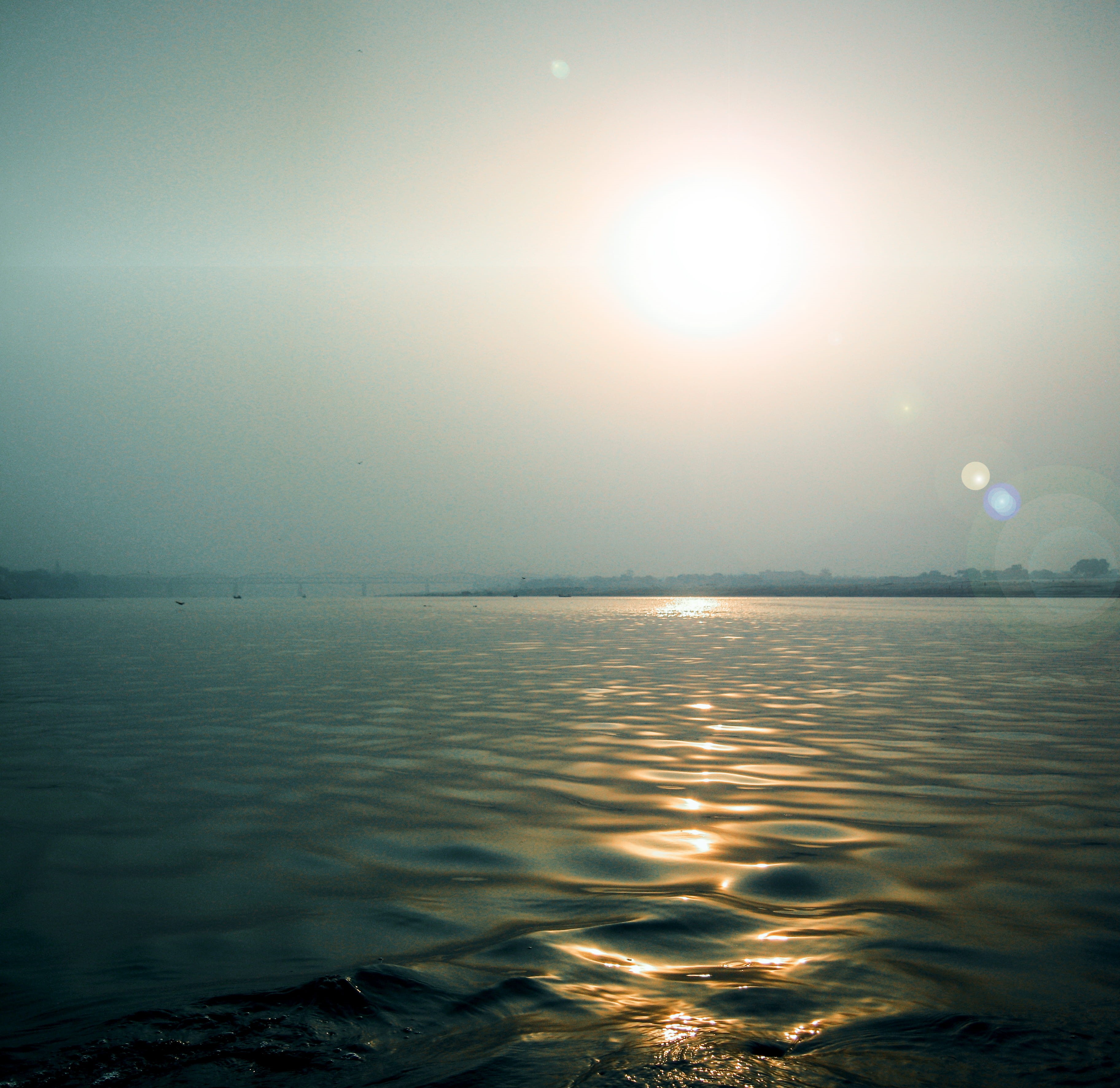 horizon over water, sun, ganga, tranquility, no people, reflection, sky, 2K, lens flare, horizon, india, land, tranquil scene, morning, ghat, outdoors, HD Wallpaper